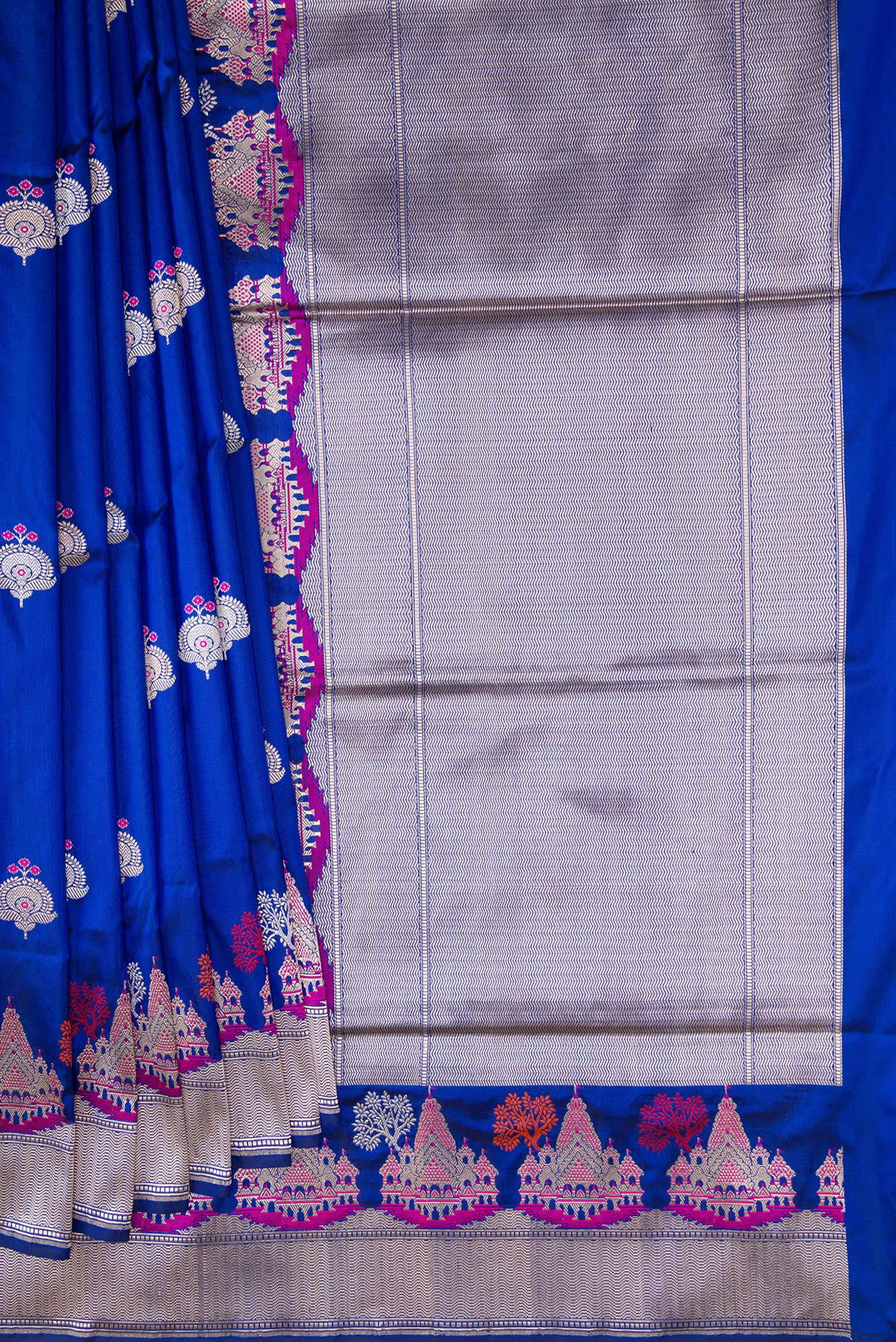 Pleats and pallu of Royal Blue Dual Tone Banarasi Silk Saree with Zari And Thread Butta on the body and Fancy Border. 
