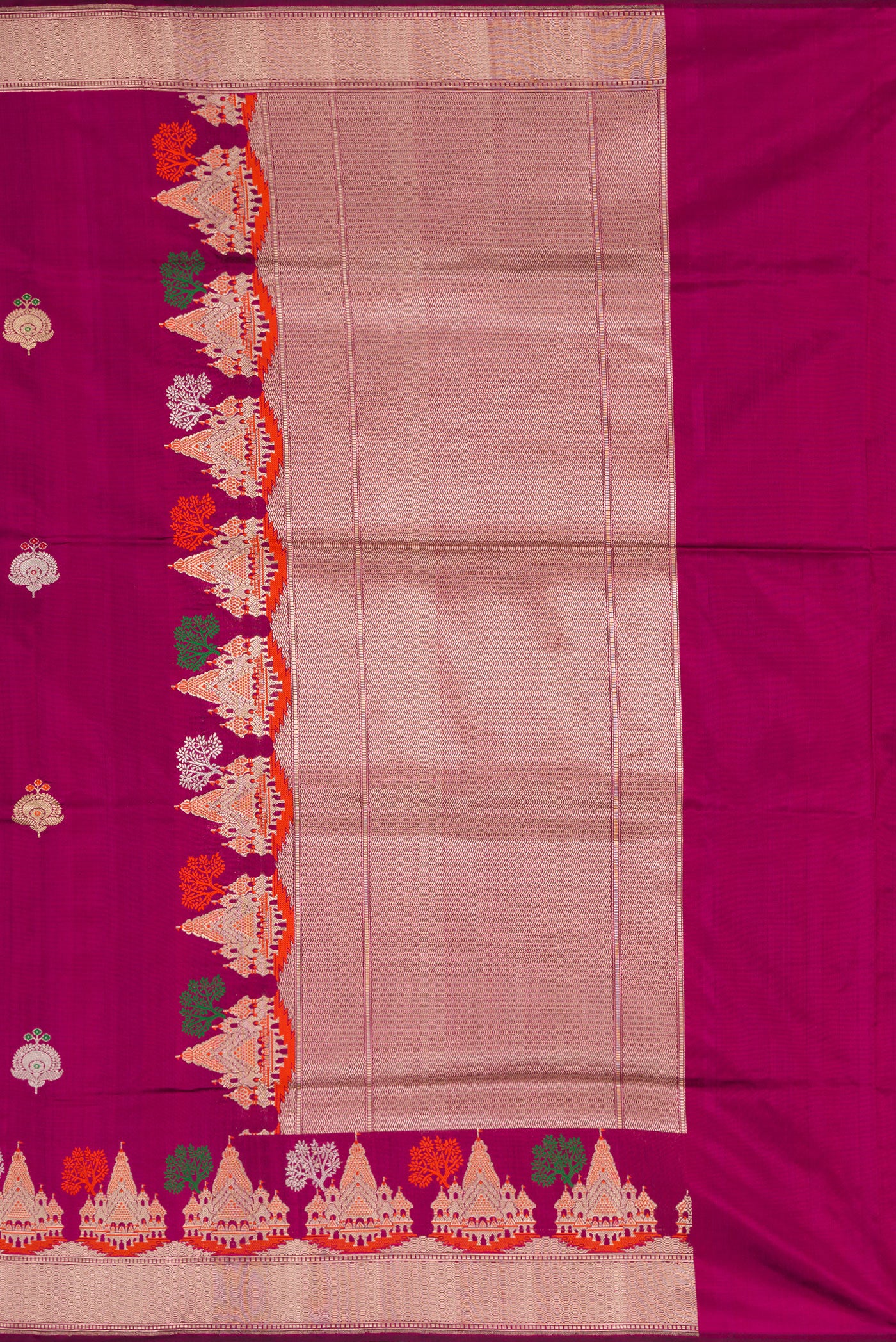 Close up image of the pallu of Magenta Dual Tone Banarasi Silk Saree with Zari And Thread Butta on the body and Fancy Border. 