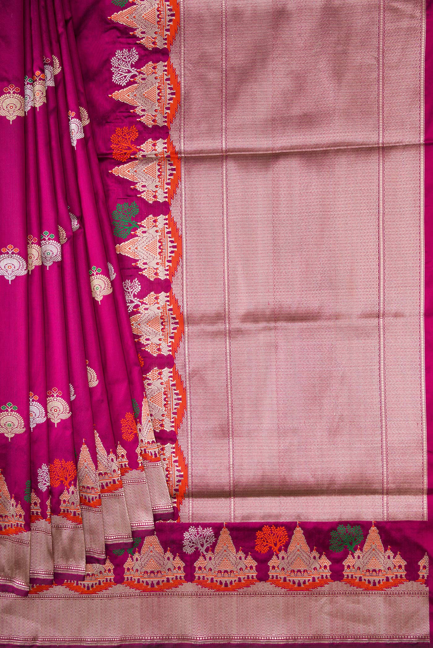 Pleats and pallu of Magenta Dual Tone Banarasi Silk Saree with Zari And Thread Butta on the body and Fancy Border. 