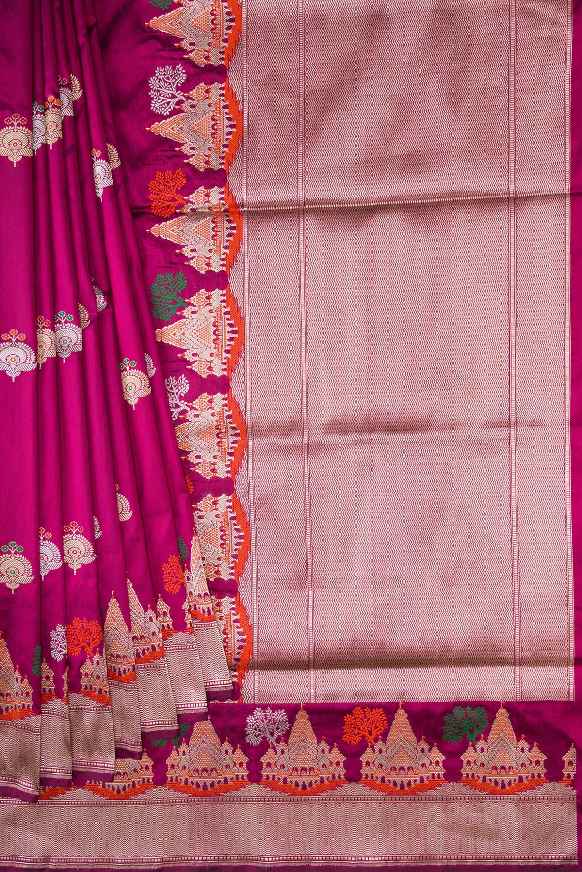 Pleats and pallu of Magenta Dual Tone Banarasi Silk Saree with Zari And Thread Butta on the body and Fancy Border. 
