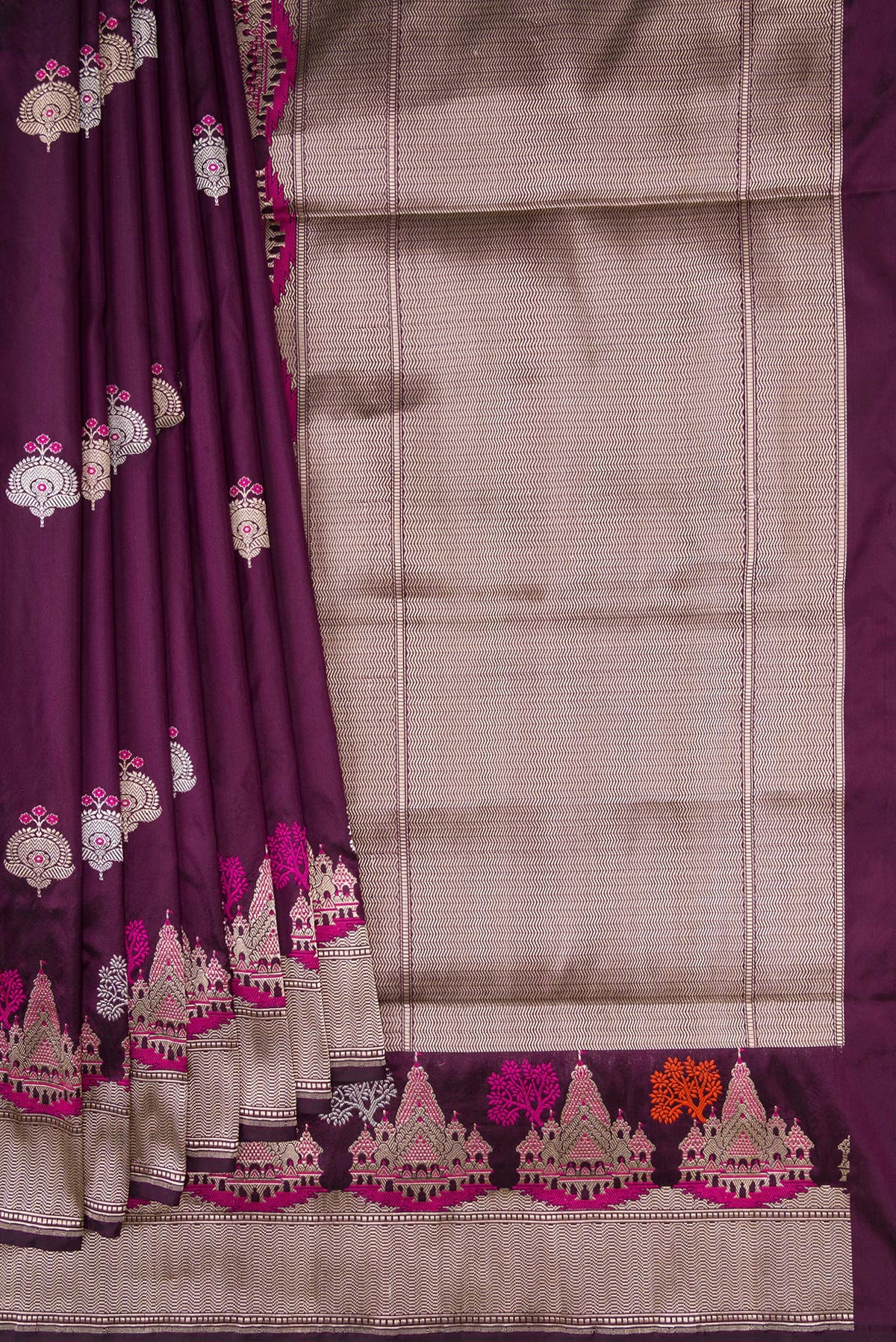 Pleats and pallu of Burgundy Dual Tone Banarasi Silk Saree with Zari And Thread Butta on the body and Fancy Border. 