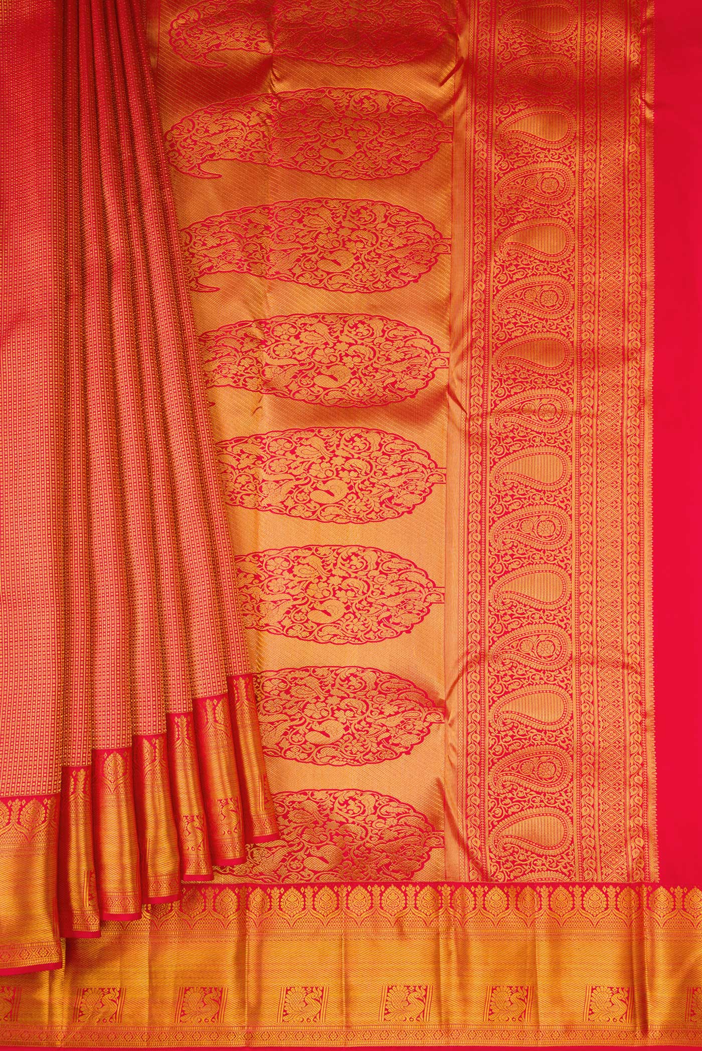 Pleats and pallu of Red Kanjivaram Silk Saree with Zari Brocade on the body and Zari Border. 