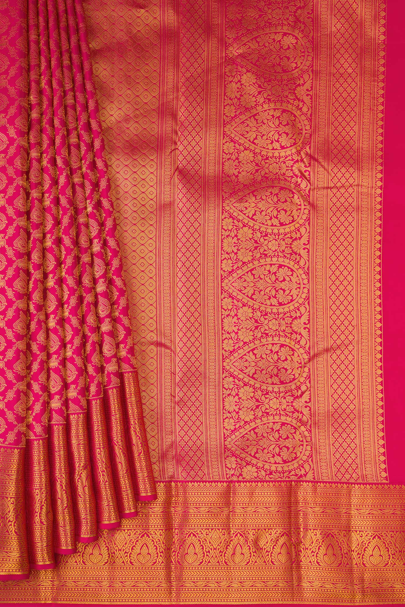 Pleats and pallu of Dark Pink Kanjivaram Silk Saree with Zari Brocade on the body and Zari Border. 