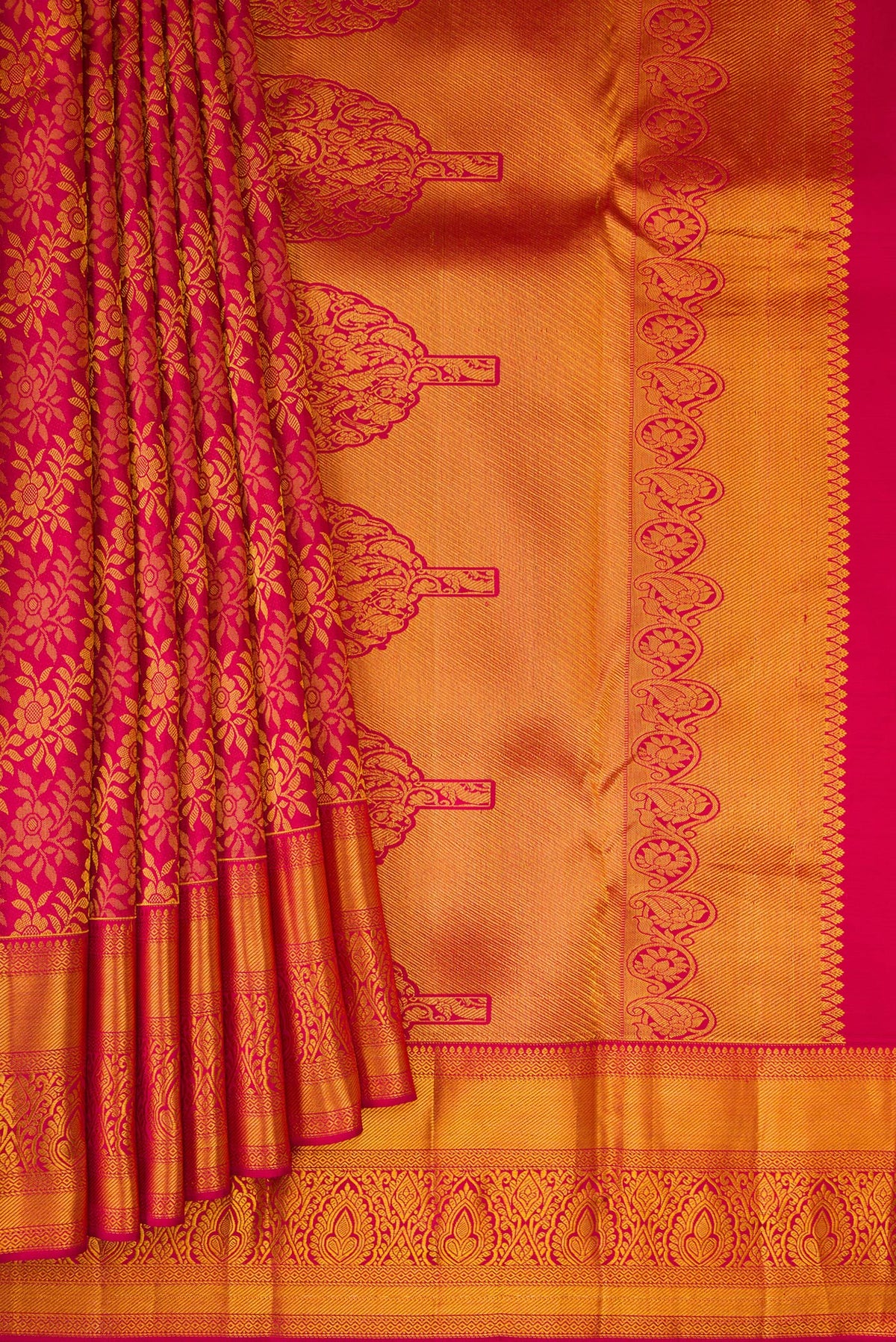 Pleats and pallu of Dark Pink Kanjivaram Silk Saree with Zari Brocade on the body and Zari Border. 