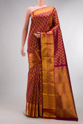 Pure Silk Maroon Kanjivaram Saree with Zari Brocade on the body and Zari Border.  displayed on a mannequin