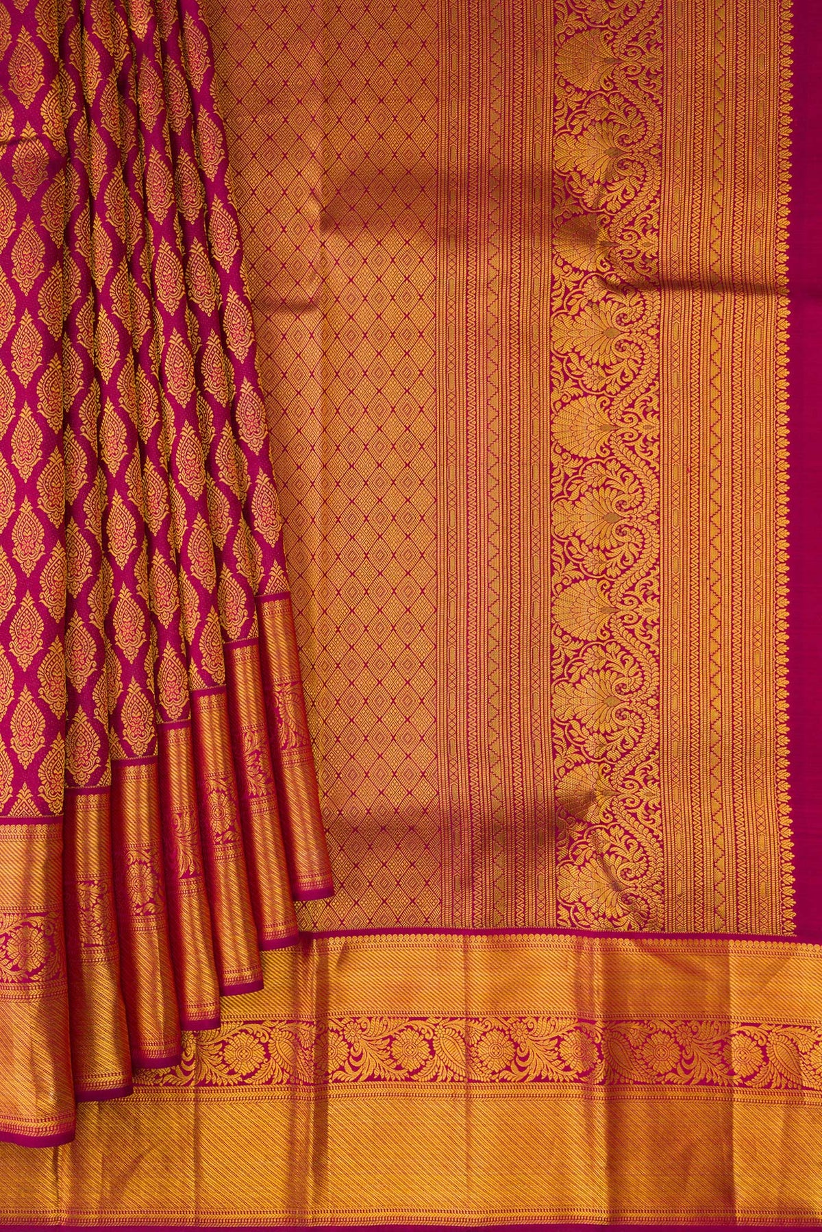 Pleats and pallu of Pure Silk Maroon Kanjivaram Saree with Zari Brocade on the body and Zari Border. 