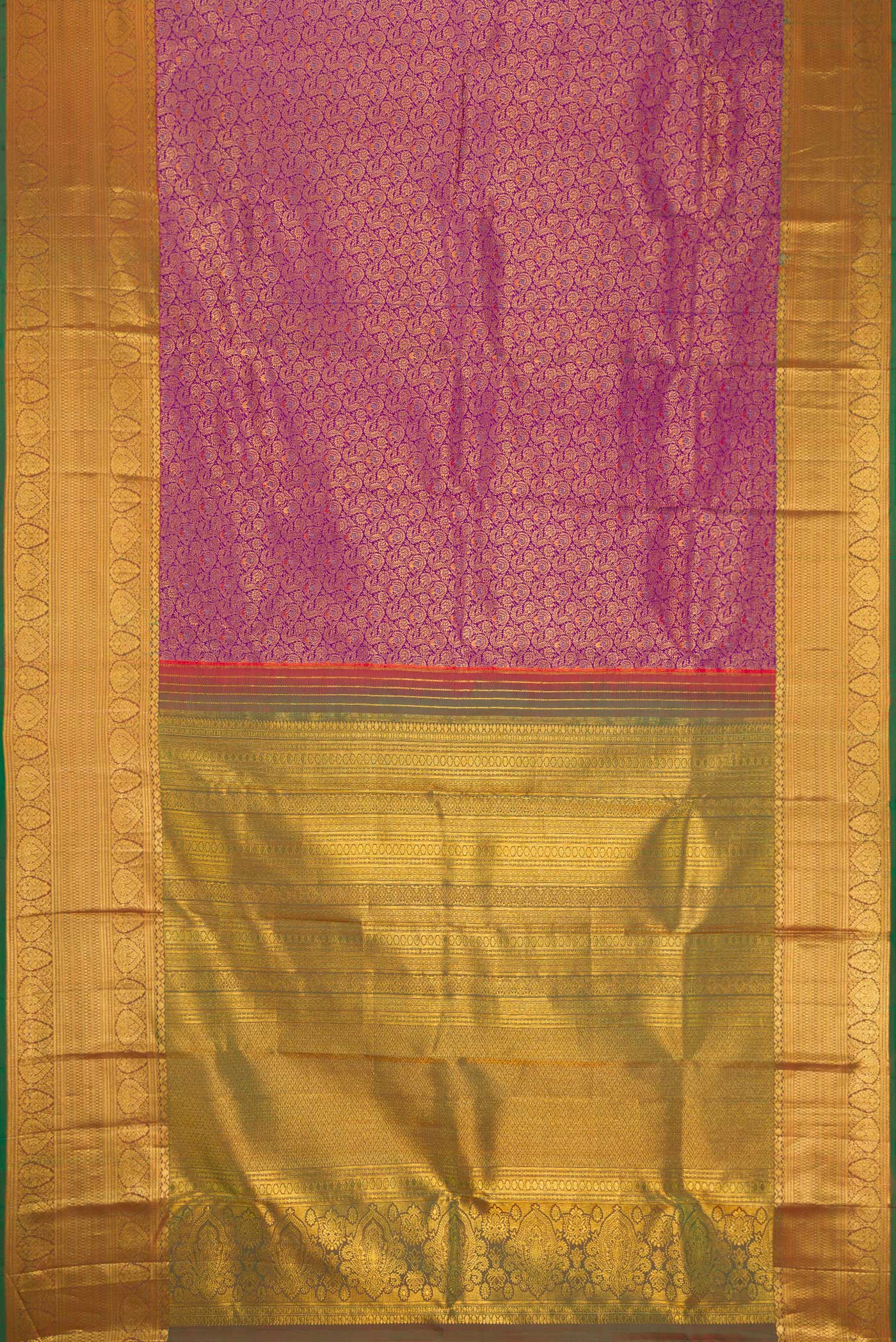 Flat view of Purple Kanjivaram Silk Saree with Zari Brocade on the body and Zari Border. 