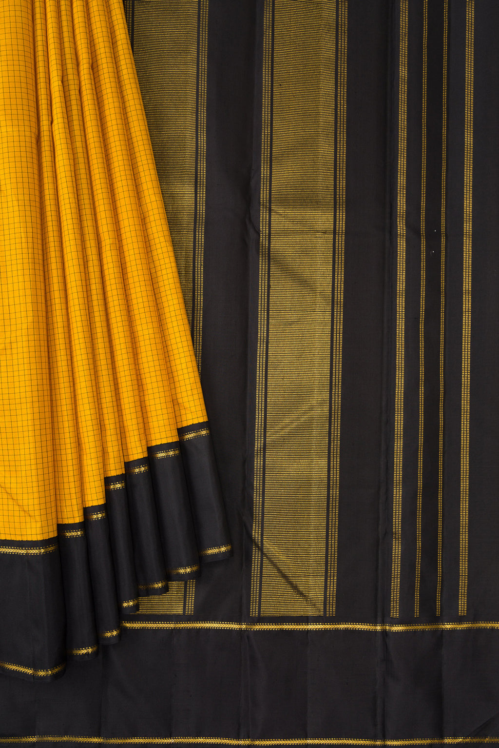 Pleats and pallu of Pure Silk Pure Zari Yellow Dual Tone Kanjivaram Saree with Checked design on the body and Zari And Thread Border. 