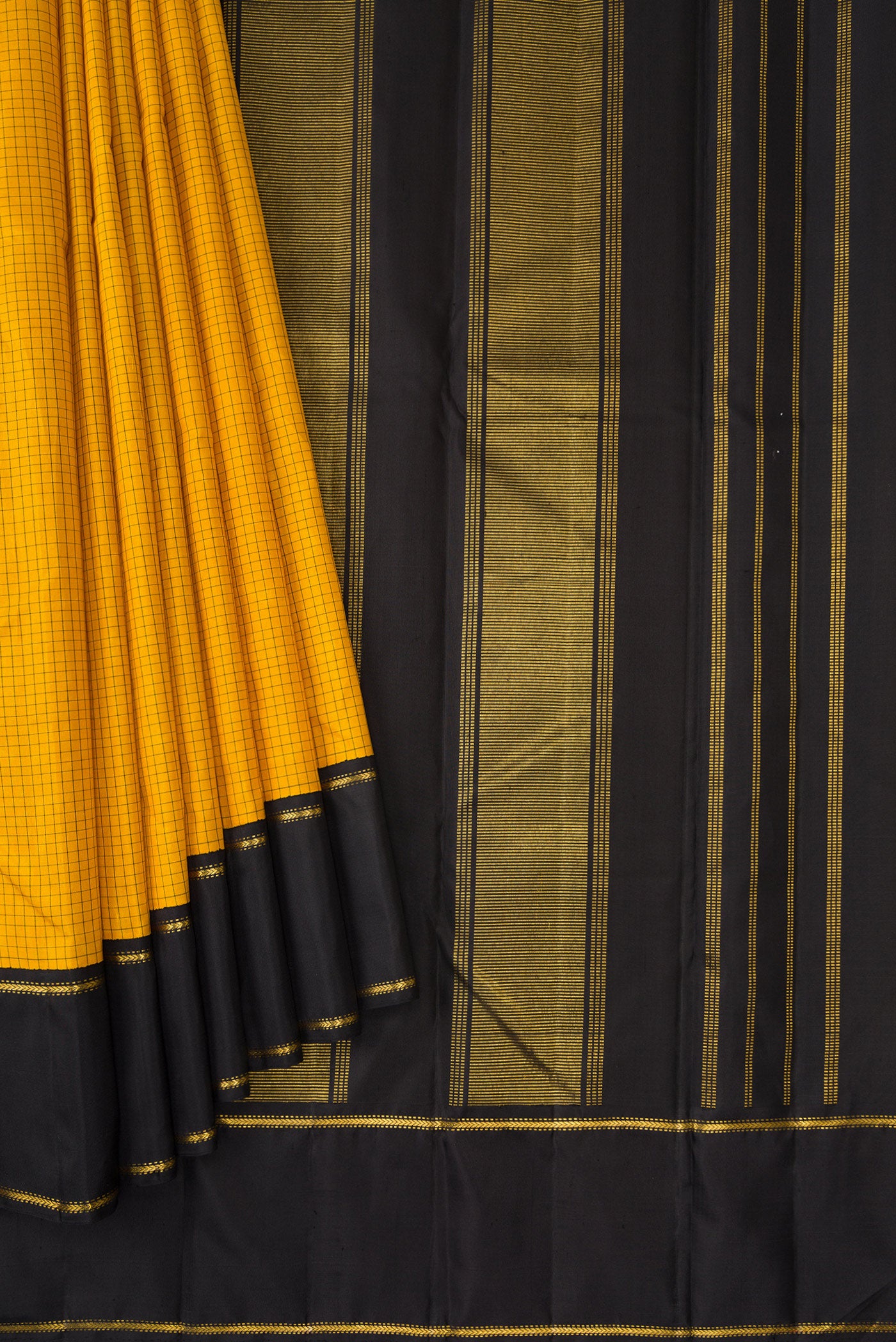 Pleats and pallu of Pure Silk Pure Zari Yellow Dual Tone Kanjivaram Saree with Checked design on the body and Zari And Thread Border. 