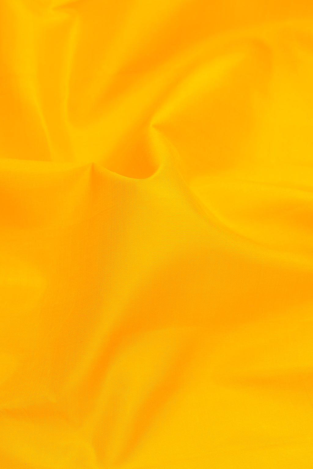 Close up of Yellow Dual Tone Kanjivaram Silk Saree with Plain Body and Temple Border.  displaying folds