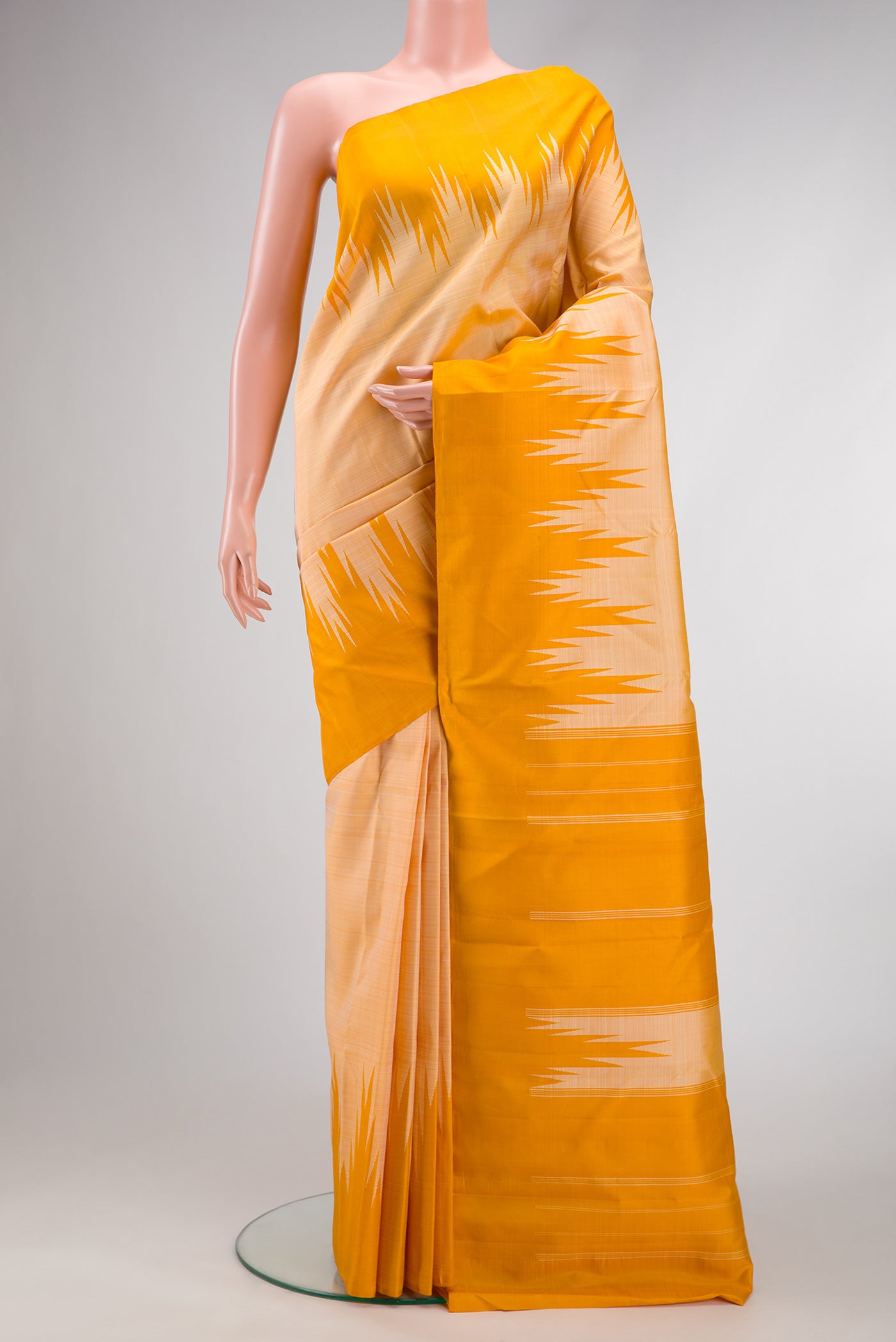 Green, Maroon & Burgundy Dual Tone Kanjivaram Silk Saree with Plain Body and Temple Border.  displayed on a mannequin