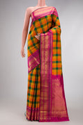 Multi Color Kanjivaram Silk Saree with Checked design on the body and Zari Border.  displayed on a mannequin