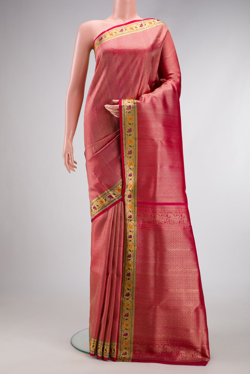 Pink Dual Tone Kanjivaram Tissue Silk Saree with Zari Brocade on the body and Paithani Border.  displayed on a mannequin