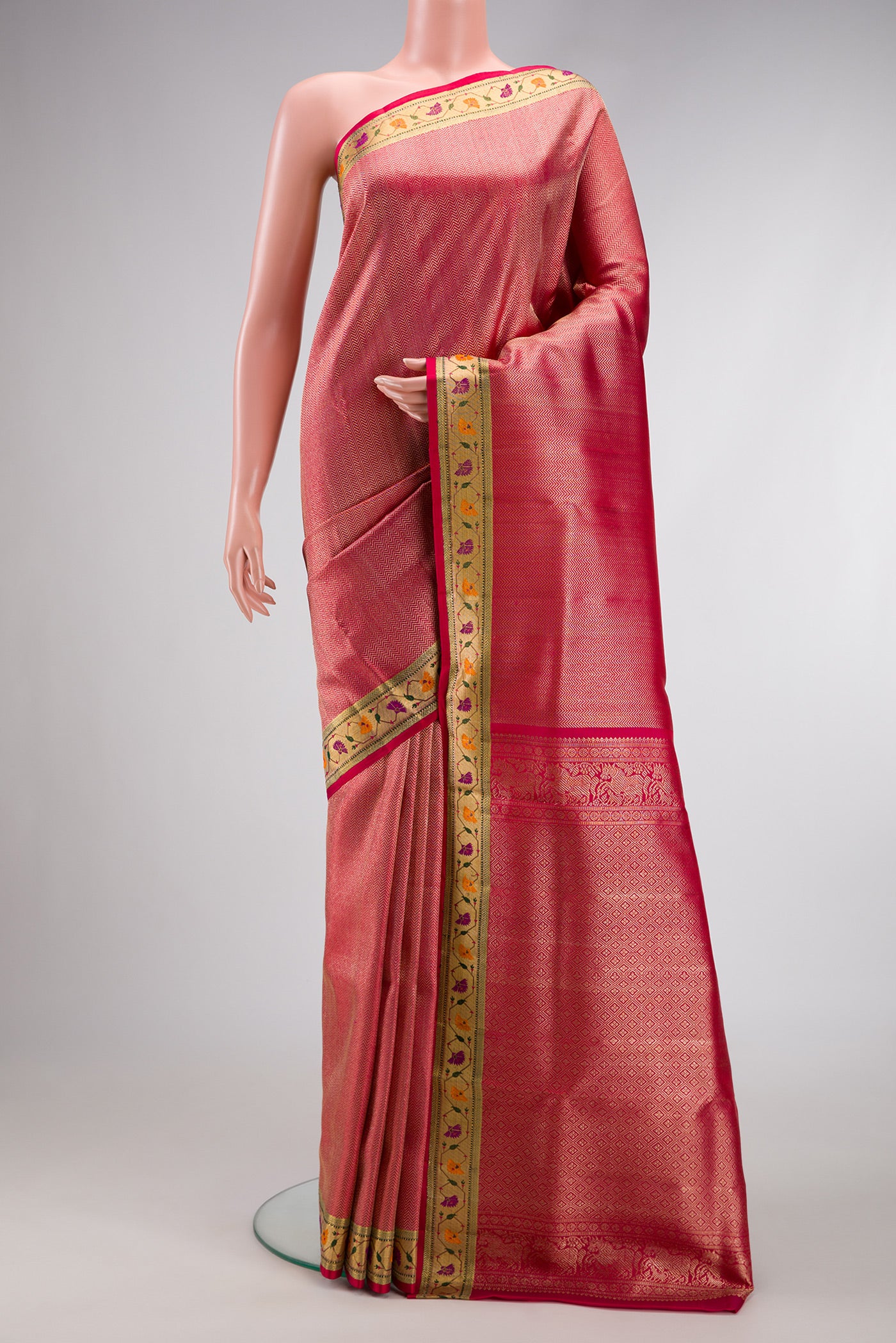 Pink Dual Tone Kanjivaram Tissue Silk Saree with Zari Brocade on the body and Paithani Border.  displayed on a mannequin