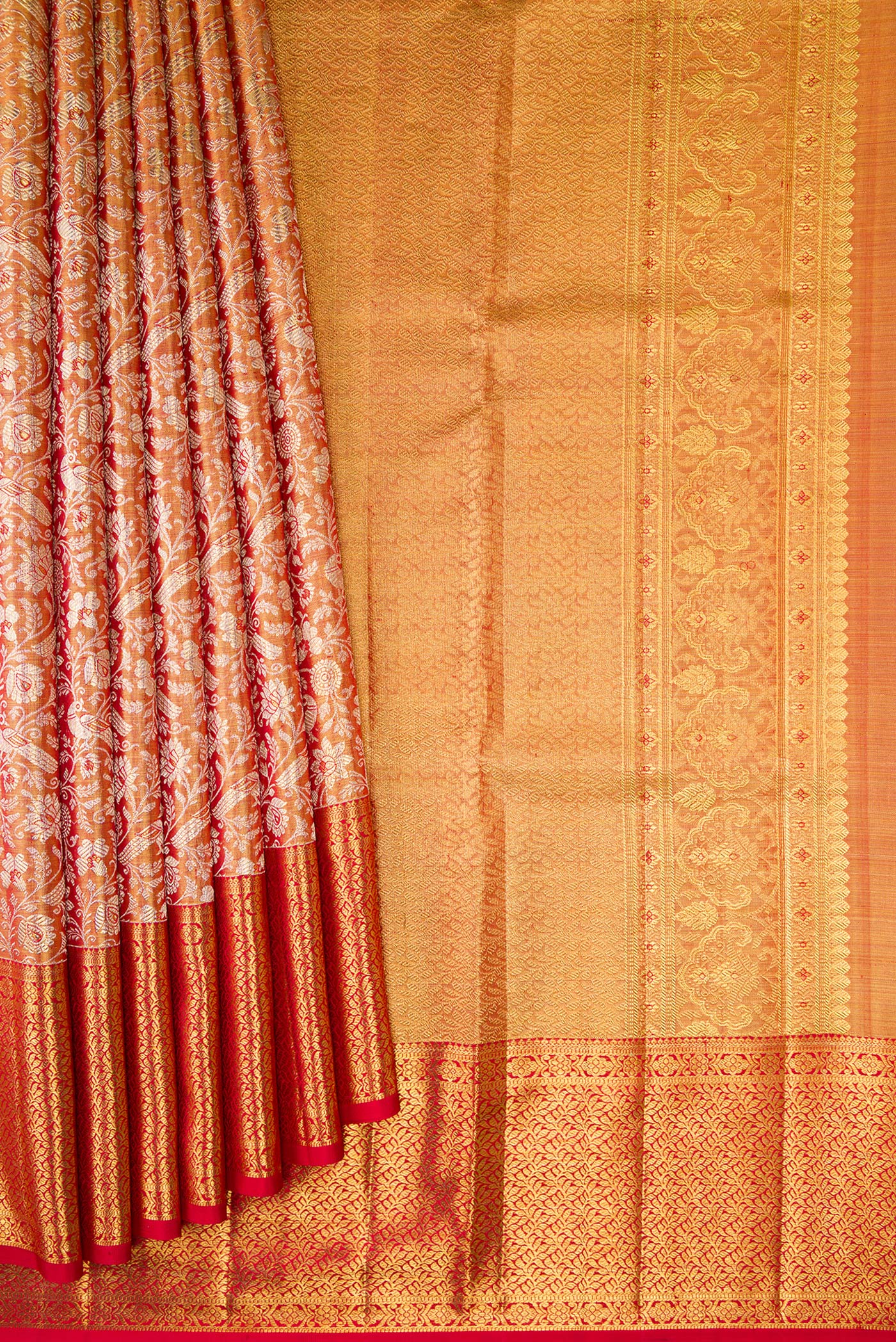Pleats and pallu of Gold Dual Tone Kanjivaram Tissue Silk Saree with Zari Brocade on the body and Zari Border. 