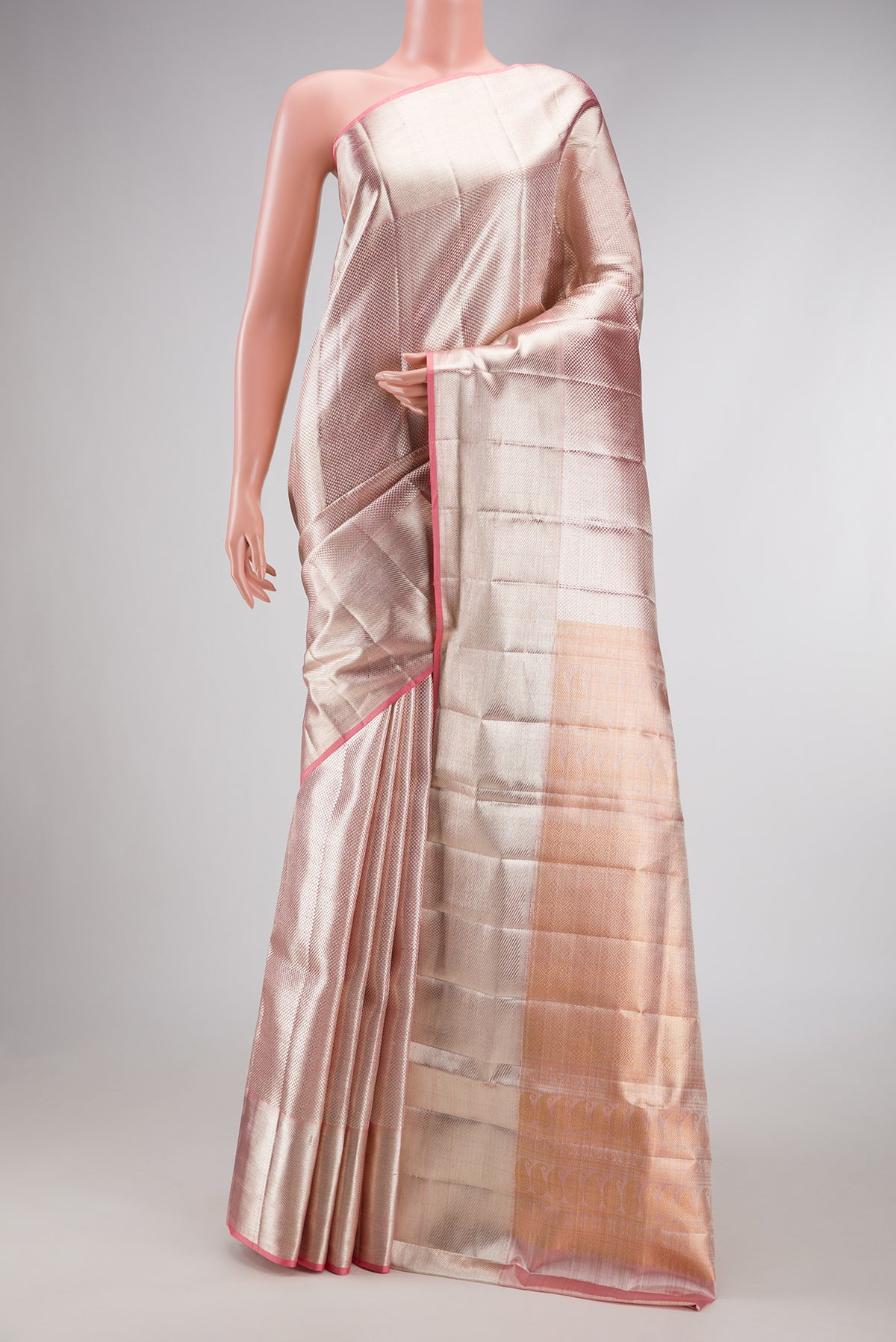 Pink Dual Tone Kanjivaram Tissue Silk Saree with Zari Brocade on the body and Zari Border.  displayed on a mannequin