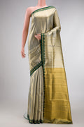 Gold Dual Tone Kanjivaram Tissue Silk Saree with Zari Brocade on the body and Temple Border.  displayed on a mannequin