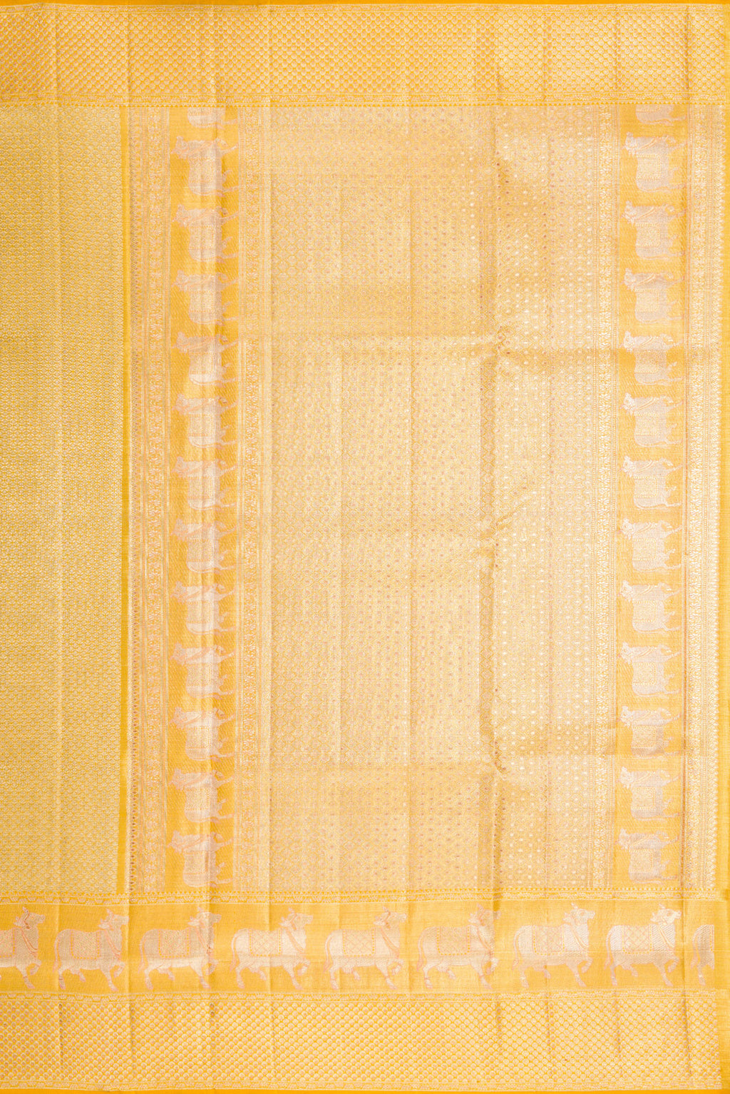 Close up image of the pallu of Pure Silk Pure Zari Yellow Dual Tone Kanjivaram Tissue Saree with Zari Brocade on the body and Fancy Border. 