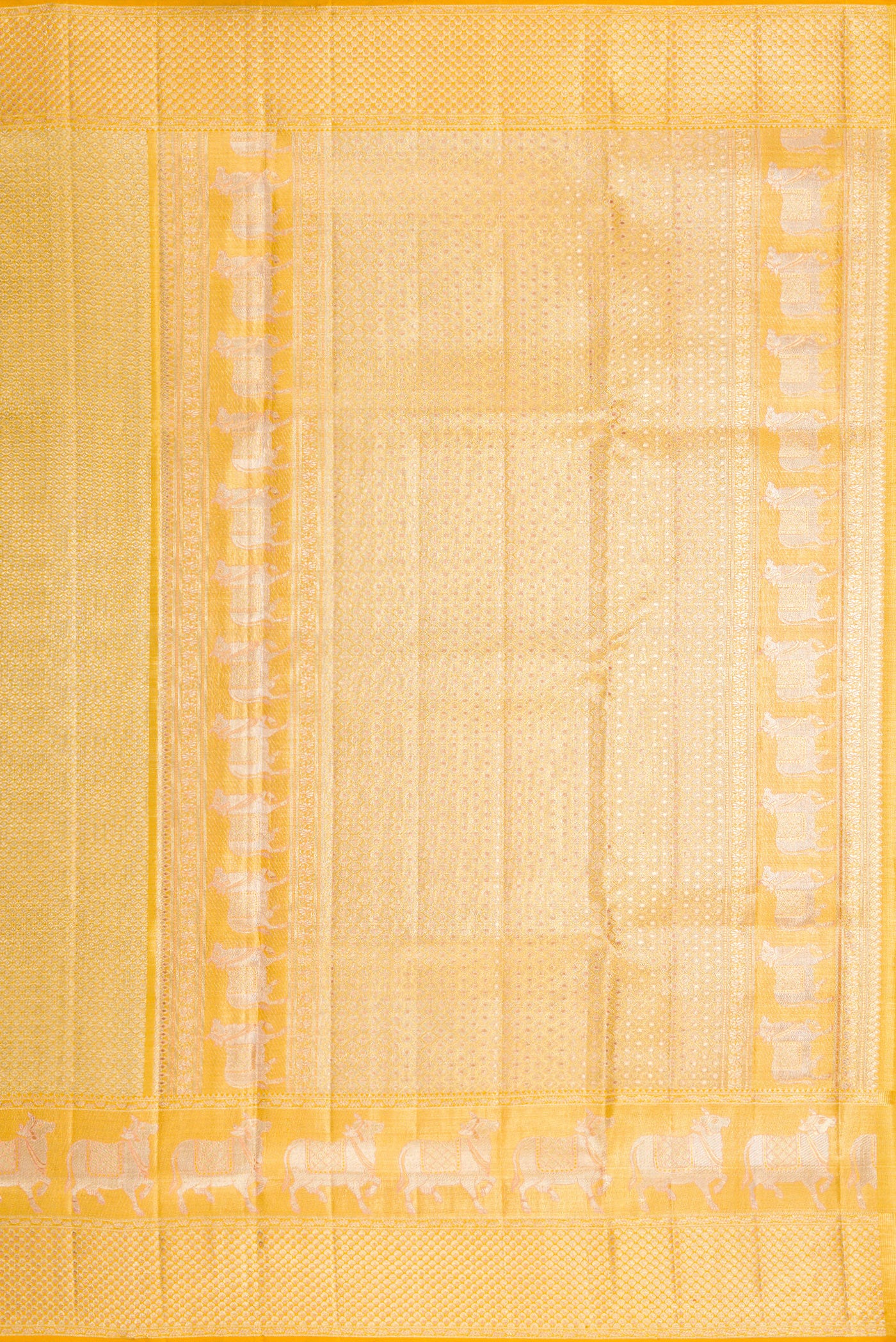 Close up image of the pallu of Pure Silk Pure Zari Yellow Dual Tone Kanjivaram Tissue Saree with Zari Brocade on the body and Fancy Border. 