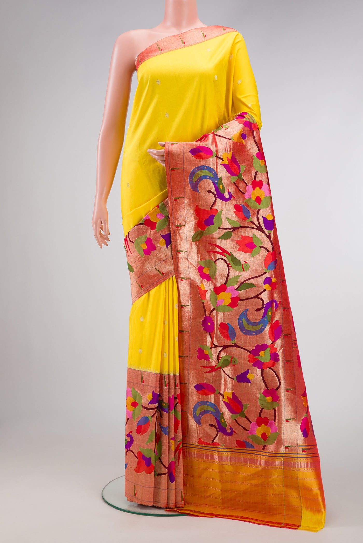 Pure Silk Pure Zari Yellow Dual Tone Paithani Saree with Zari Butta on the body and Paithani Border.  displayed on a mannequin