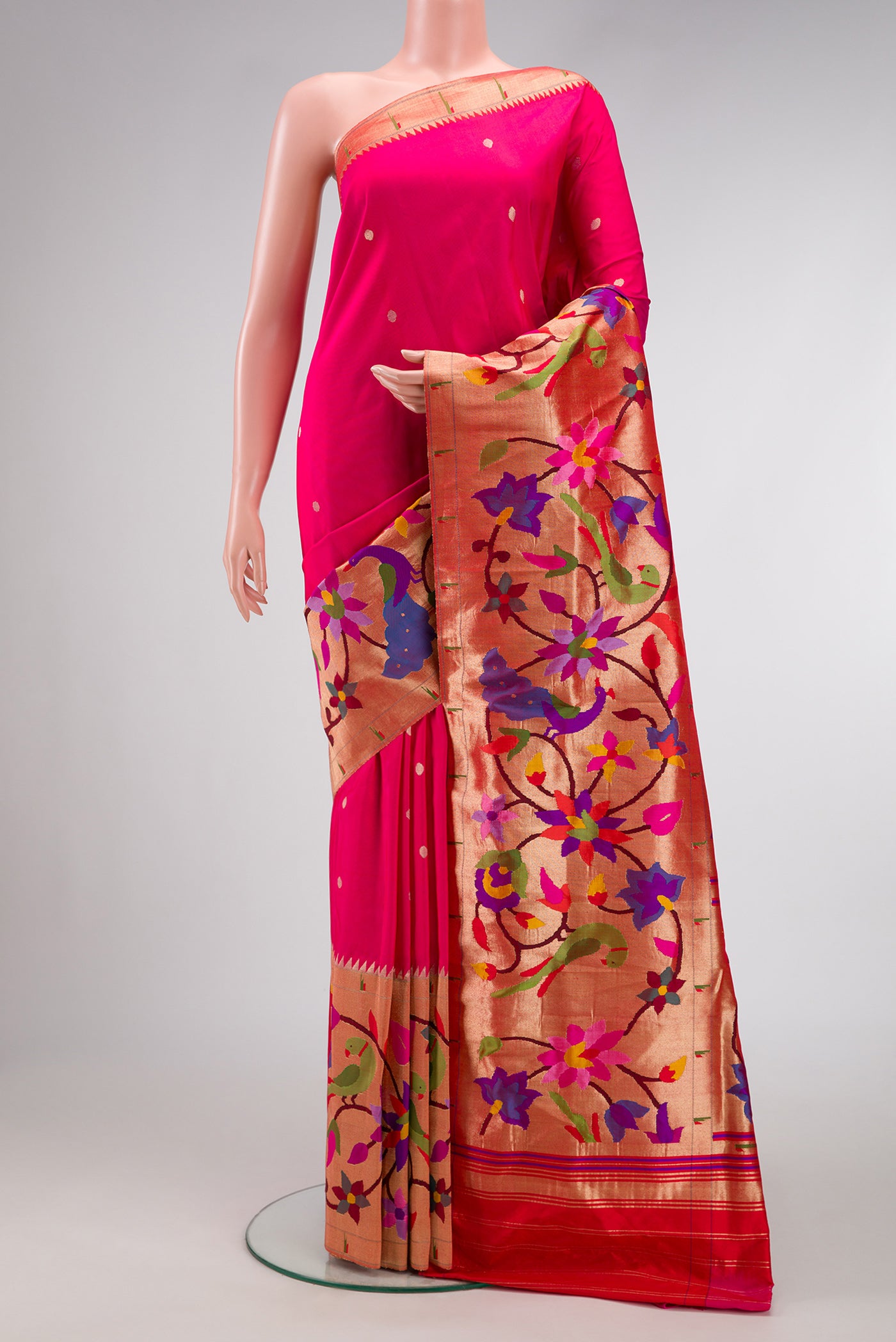 Pure Silk Pure Zari Pink Dual Tone Paithani Saree with Zari Butta on the body and Paithani Border.  displayed on a mannequin