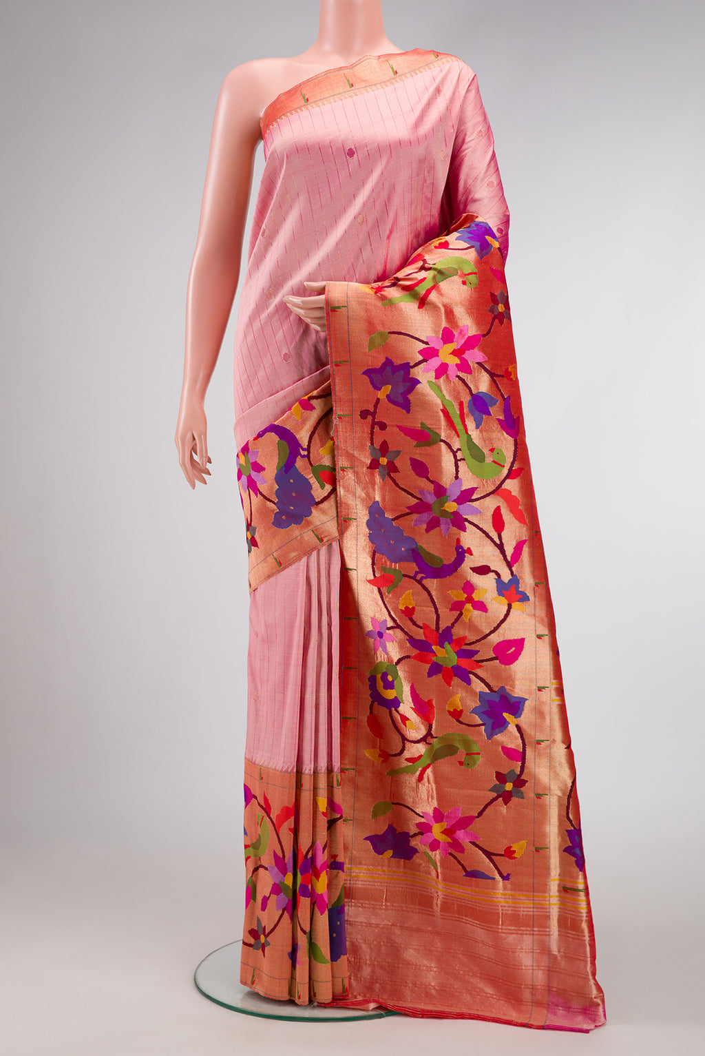 Pure Silk Pure Zari Rose Gold Dual Tone Paithani Saree with Stripes on the body and Paithani Border.  displayed on a mannequin