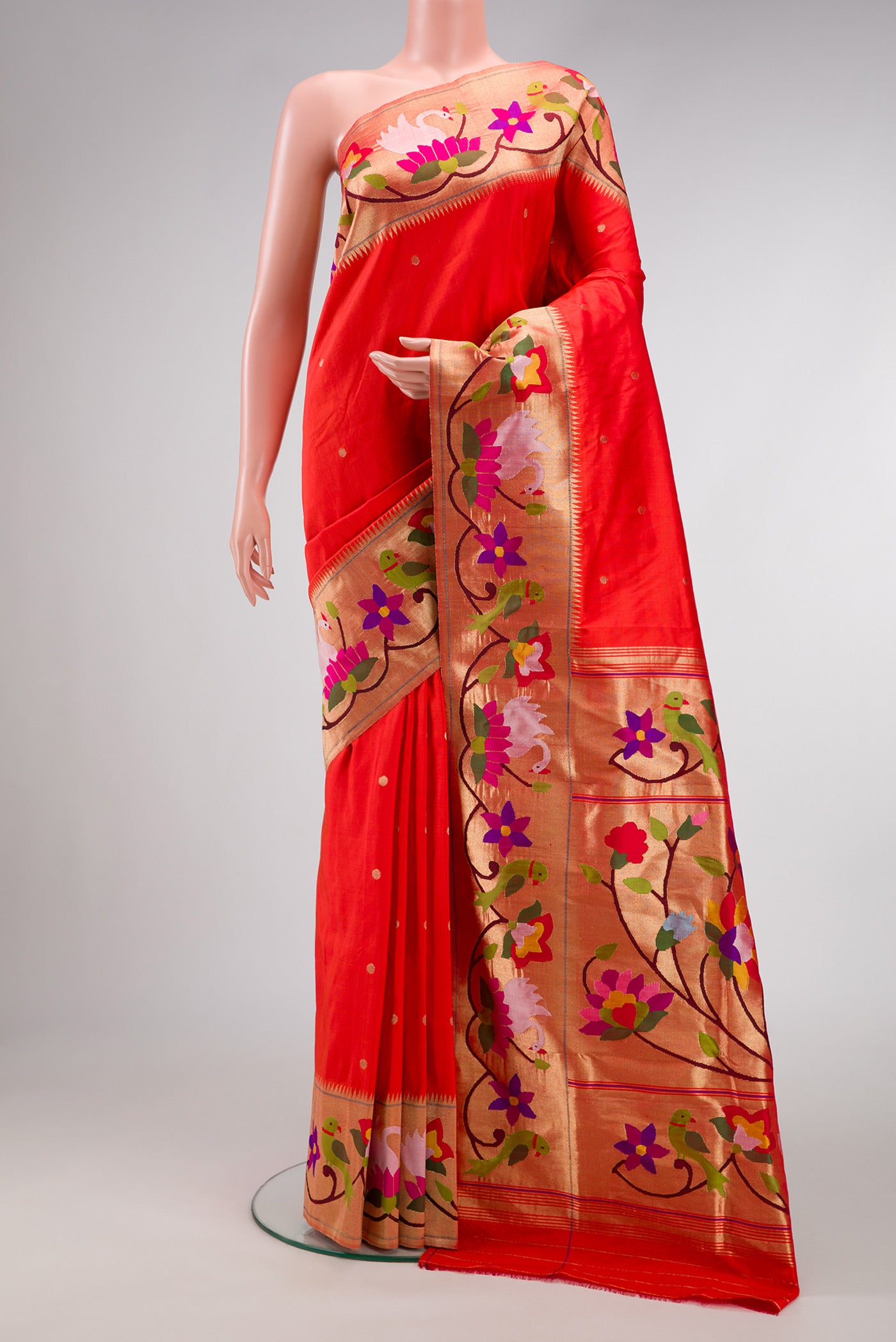 Pure Silk Pure Zari Red Dual Tone Paithani Saree with Zari Butta on the body and Paithani Border.  displayed on a mannequin