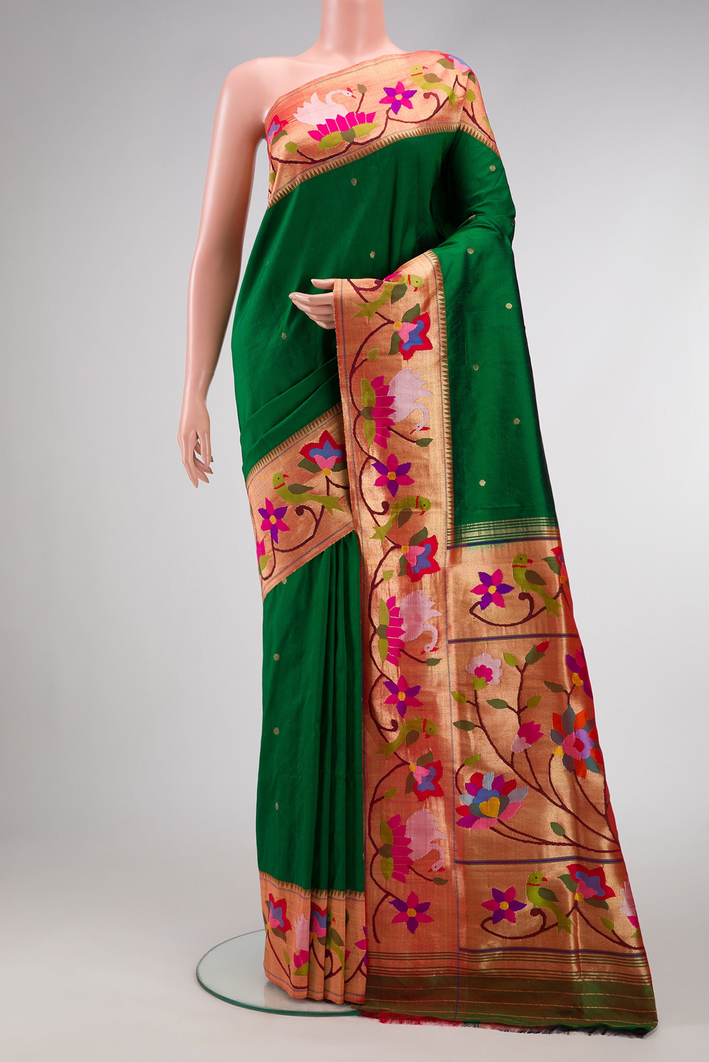 Pure Silk Pure Zari Bottle Green Dual Tone Paithani Saree with Zari Butta on the body and Paithani Border.  displayed on a mannequin