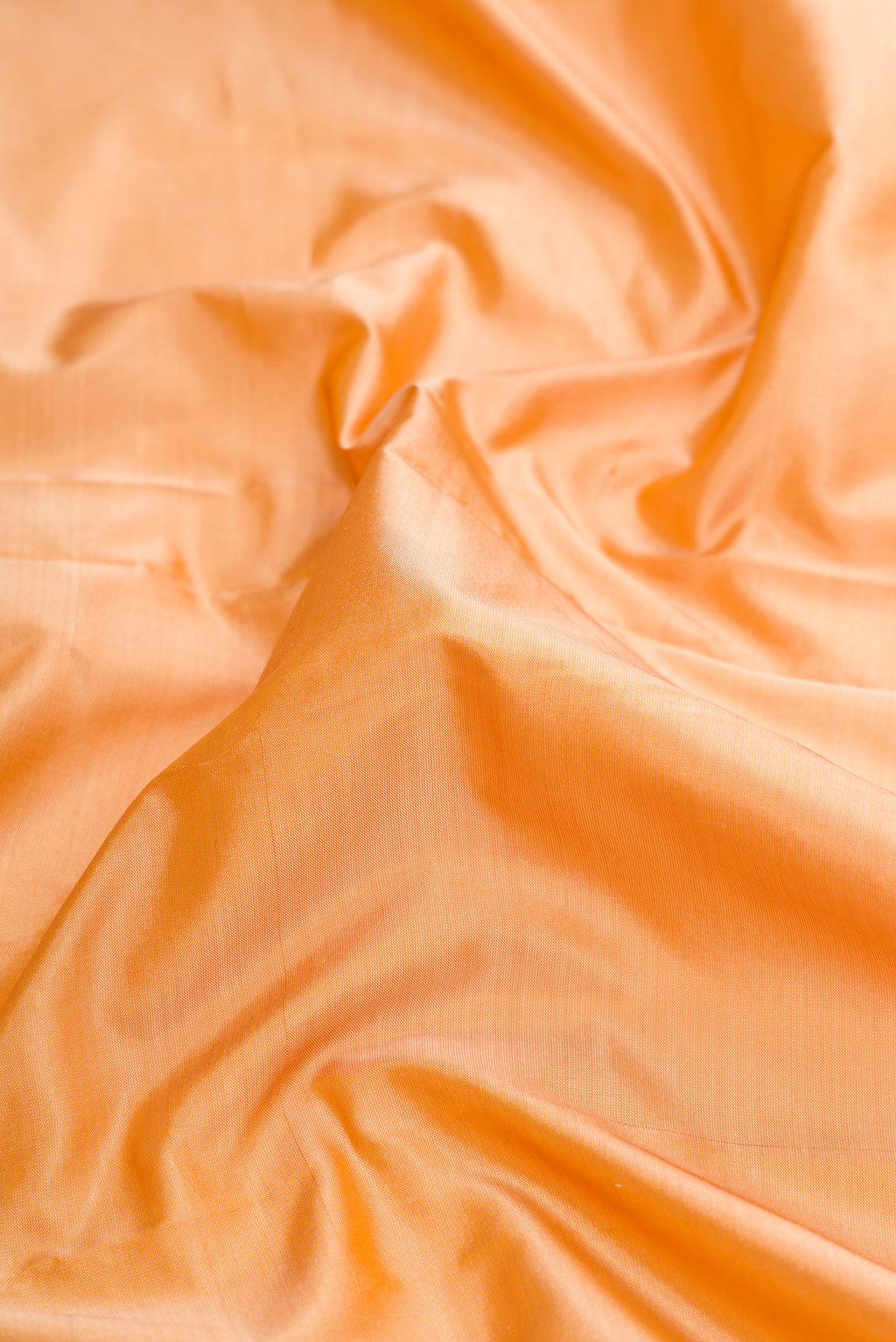 Close up of Sandal Dual Tone Kanjivaram Silk Saree with Plain Body and Temple Border.  displaying folds