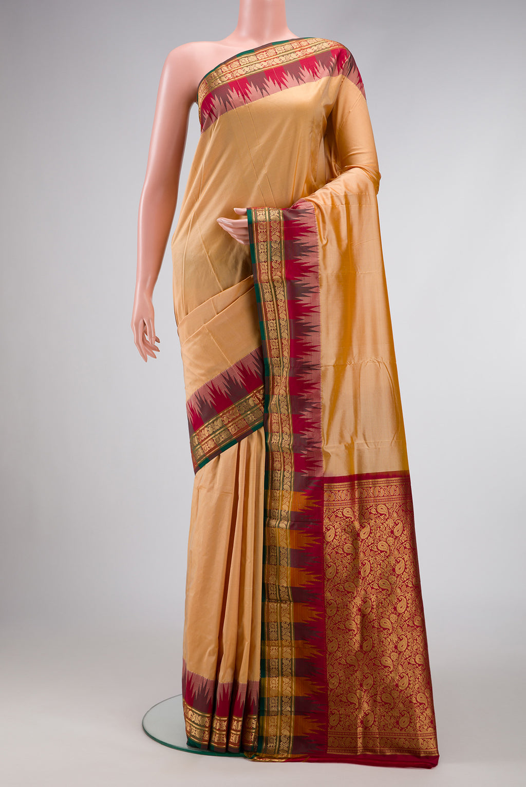 Sandal Dual Tone Kanjivaram Silk Saree with Plain Body and Temple Border.  displayed on a mannequin