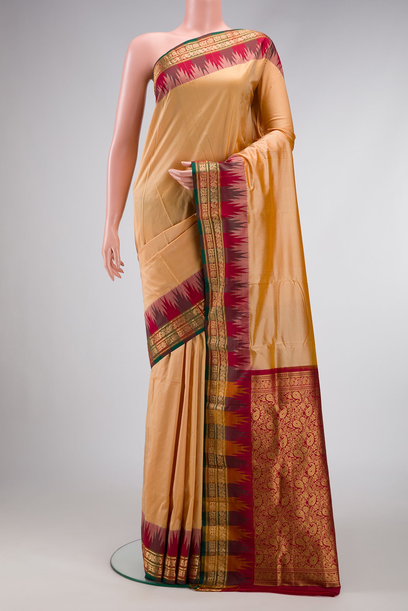 Sandal Dual Tone Kanjivaram Silk Saree with Plain Body and Temple Border.  displayed on a mannequin