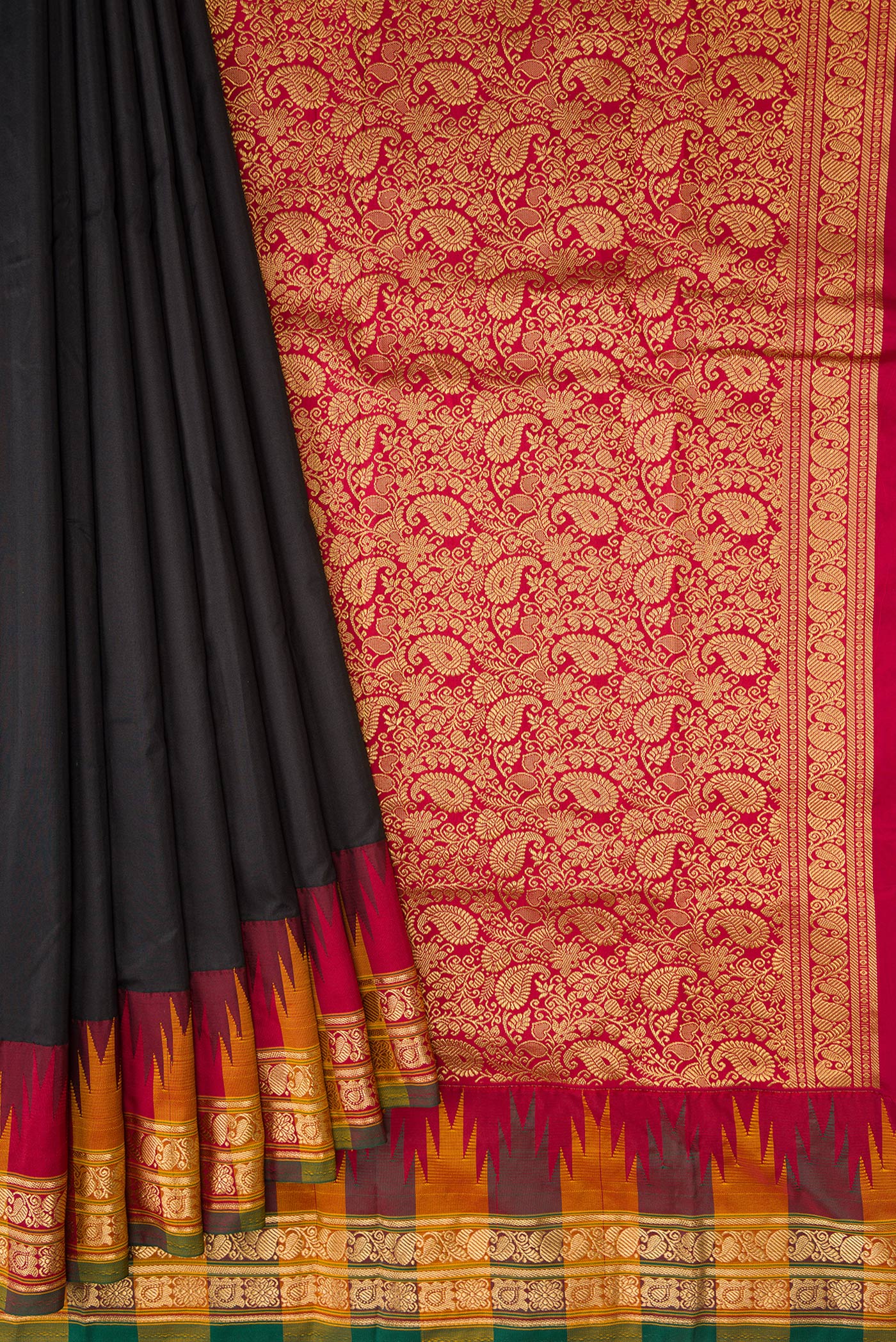 Pleats and pallu of Black Dual Tone Kanjivaram Silk Saree with Plain Body and Zari Border. 