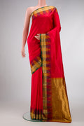 Red Dual Tone Kanjivaram Silk Saree with Plain Body and Temple Border.  displayed on a mannequin
