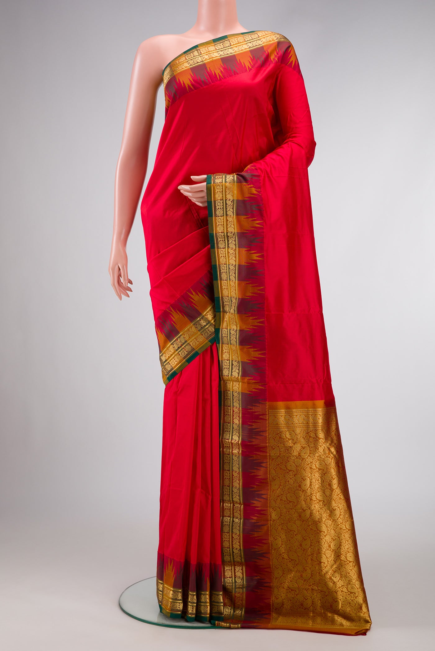 Red Dual Tone Kanjivaram Silk Saree with Plain Body and Temple Border.  displayed on a mannequin