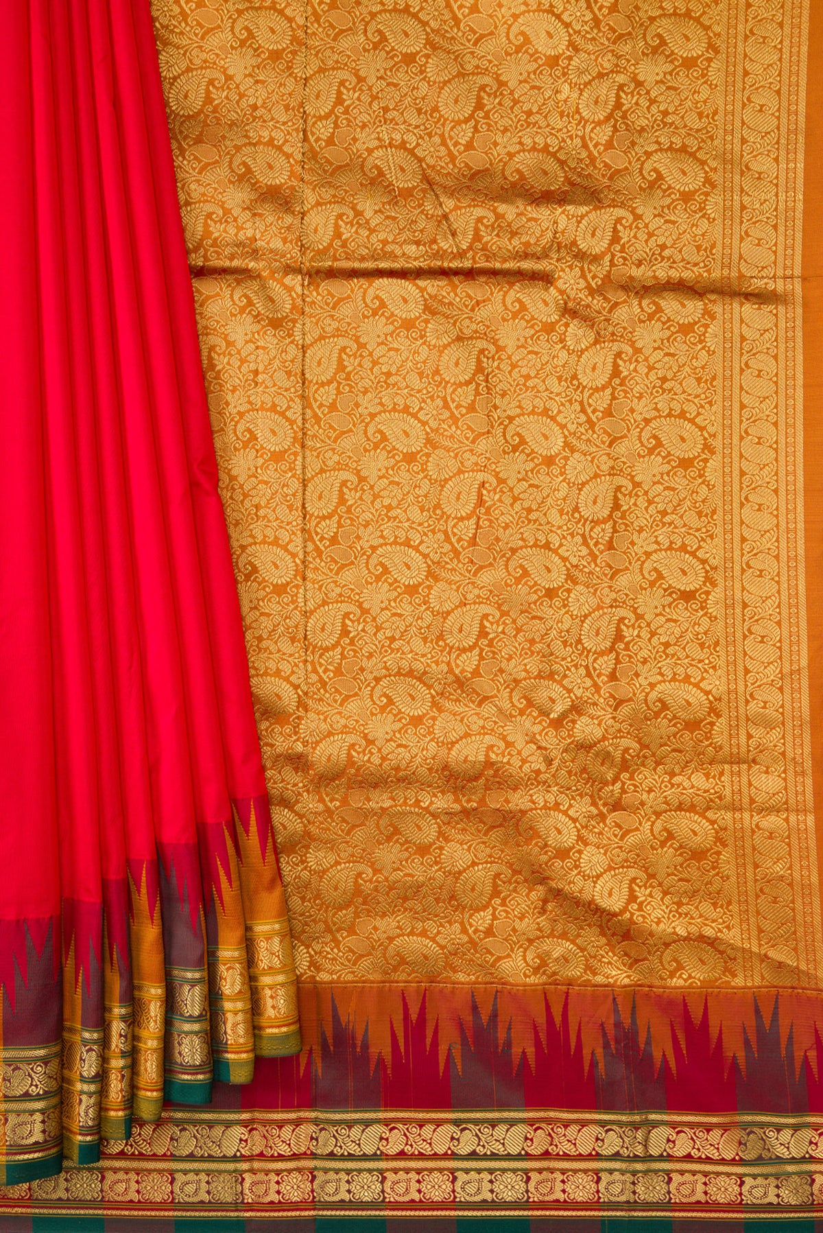 Pleats and pallu of Red Dual Tone Kanjivaram Silk Saree with Plain Body and Temple Border. 