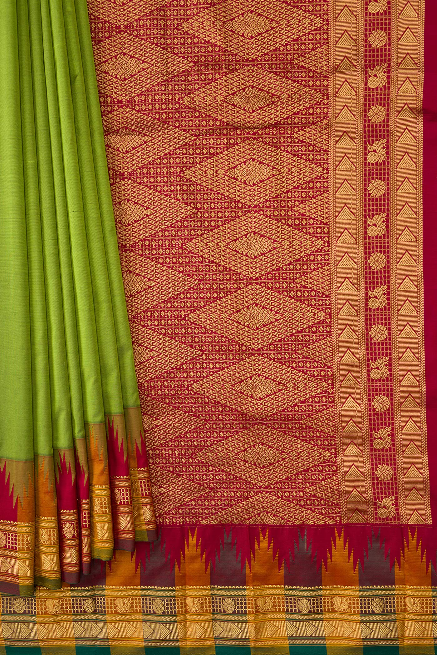 Pleats and pallu of Pista Green Dual Tone Kanjivaram Silk Saree with Zari Butta on the body and Temple Border. 