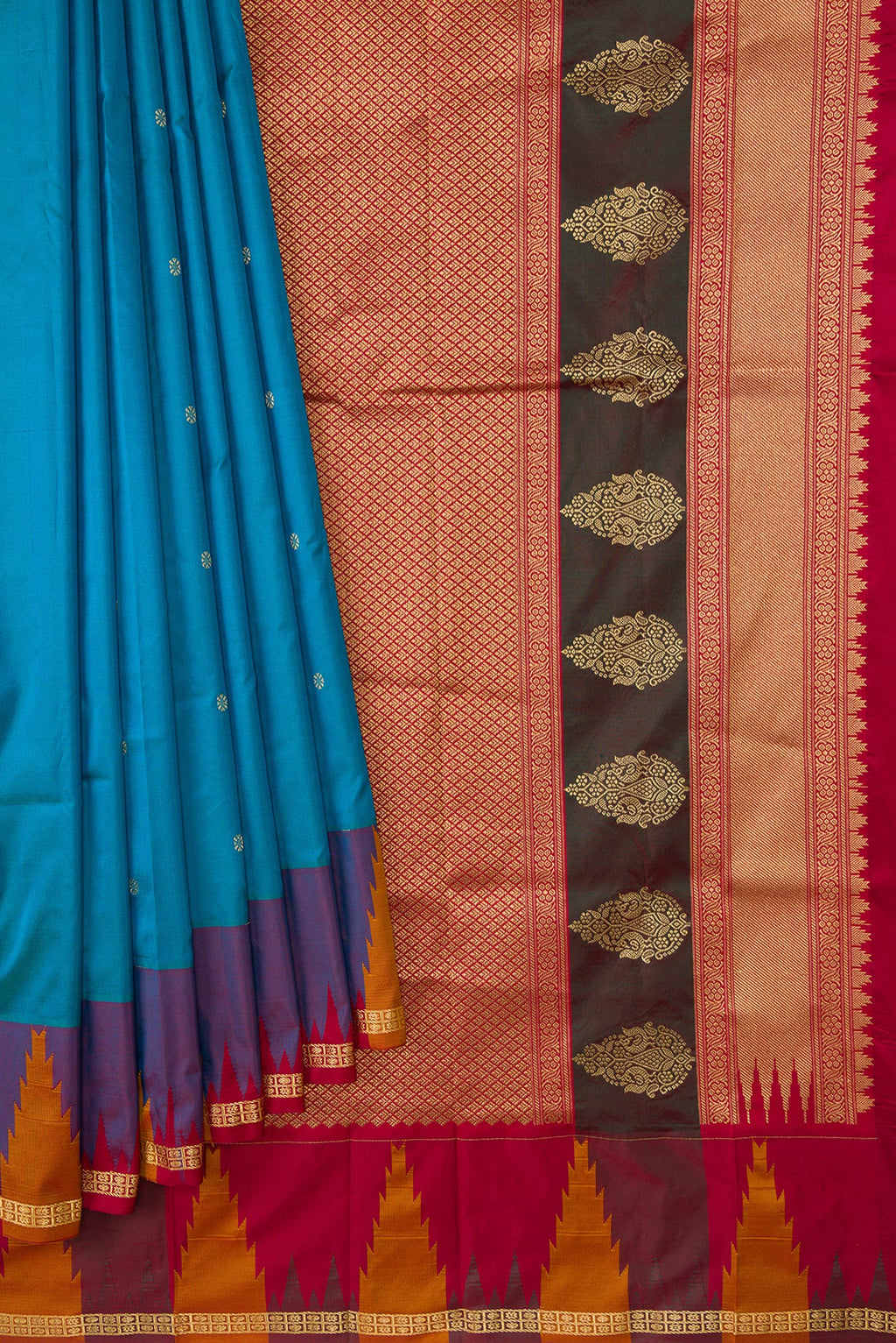 Pleats and pallu of Peacock Blue Dual Tone Kanchipuram Silk Saree with Plain Body and Temple Border. 