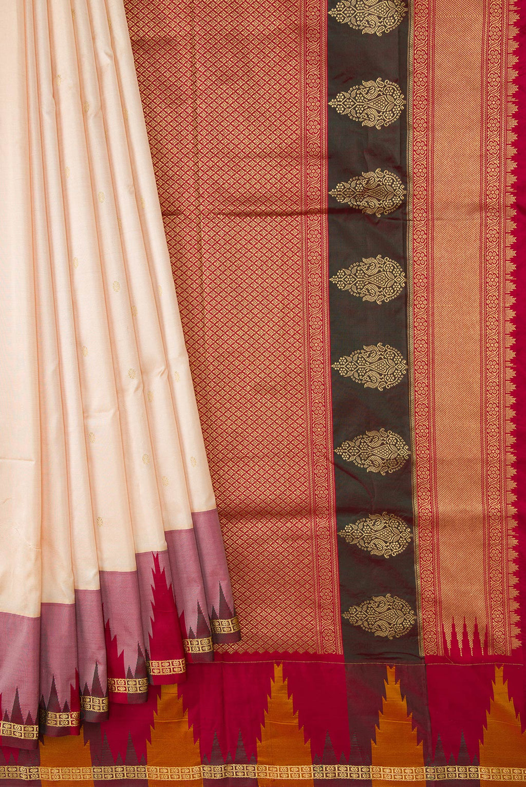 Pleats and pallu of Off White Dual Tone Kanchipuram Silk Saree with Zari Butta on the body and Temple Border. 