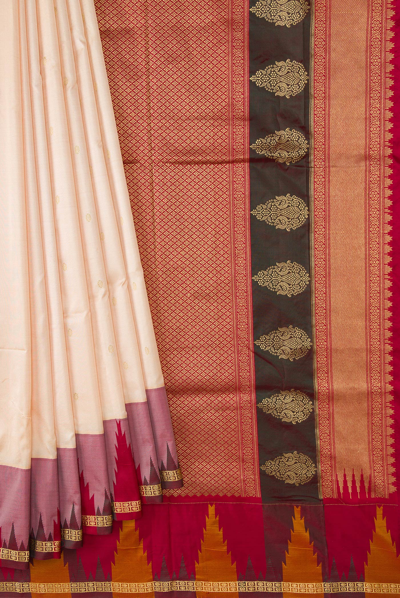 Pleats and pallu of Off White Dual Tone Kanchipuram Silk Saree with Zari Butta on the body and Temple Border. 