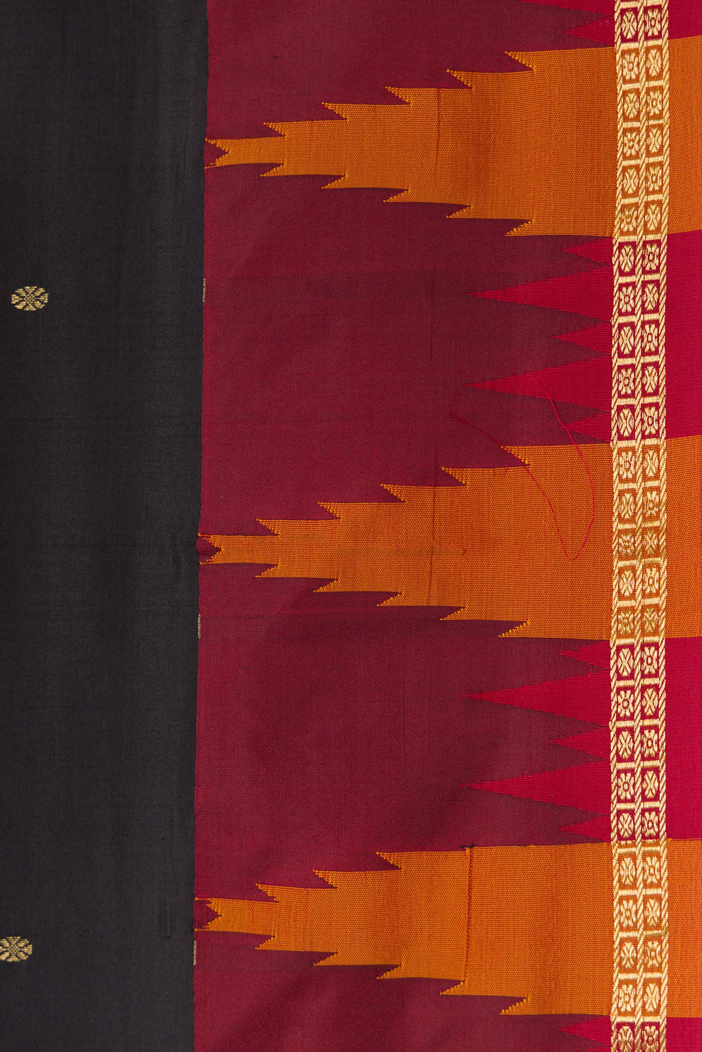 Border image of Black Dual Tone Kanchipuram Silk Saree with Zari Butta on the body and Temple Border. 