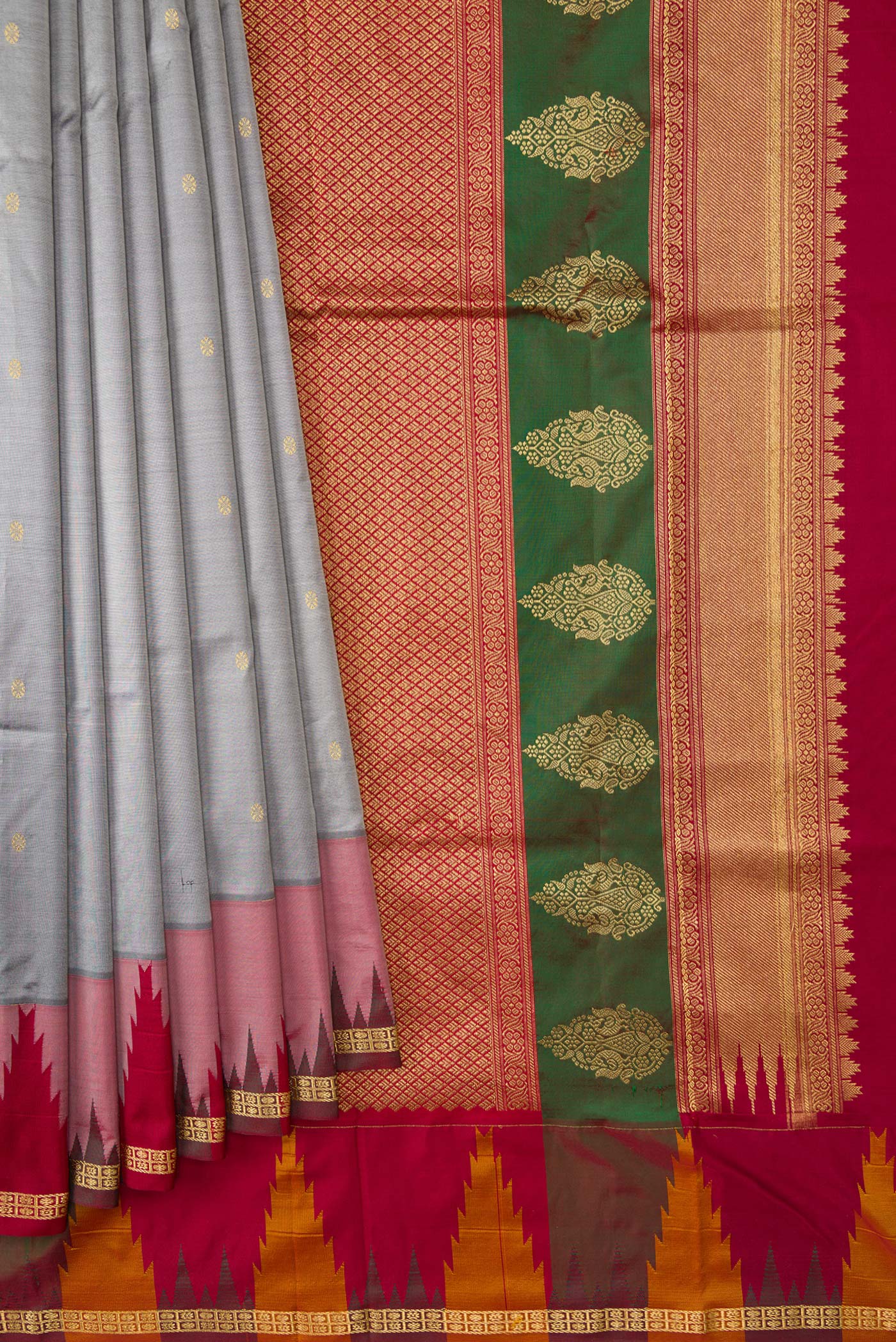 Pleats and pallu of Grey Dual Tone Kanchipuram Silk Saree with Zari Butta on the body and Temple Border. 