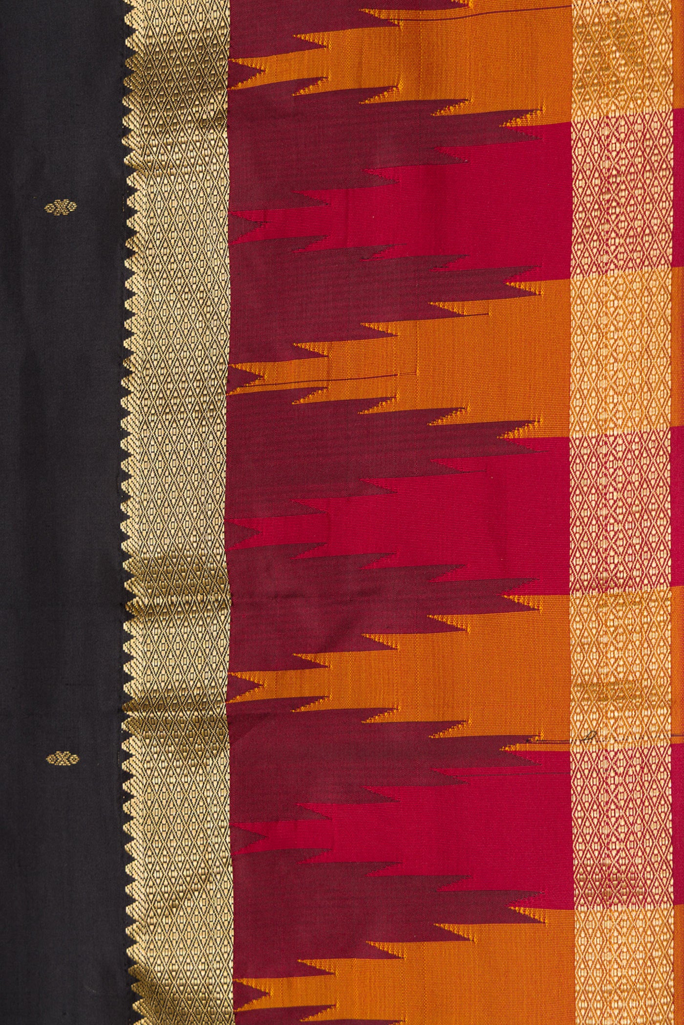 Border image of Black Dual Tone Kanchipuram Silk Saree with Zari Butta on the body and Zari Border. 