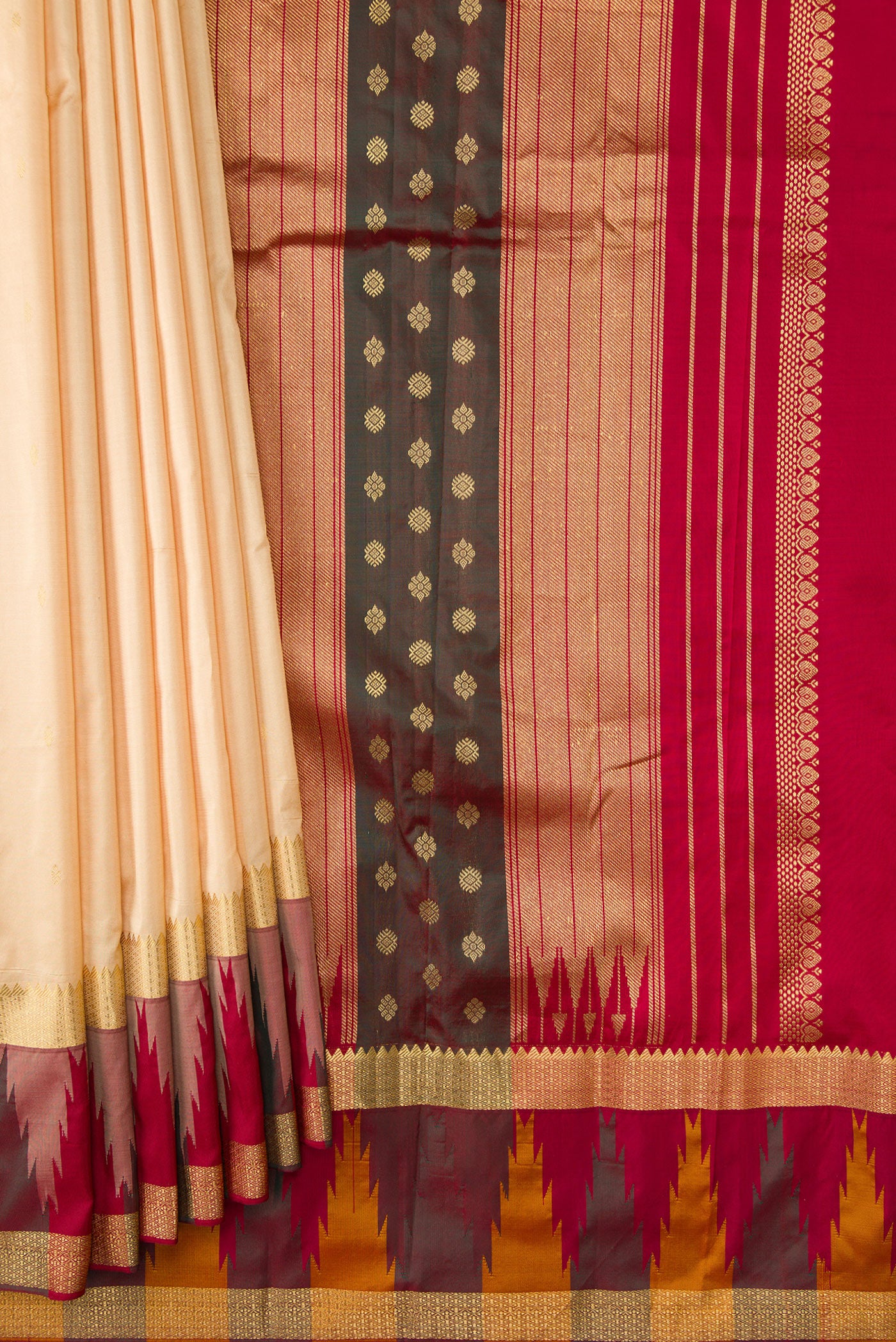 Pleats and pallu of Sandal Dual Tone Kanchipuram Silk Saree with Zari Butta on the body and Temple Border. 