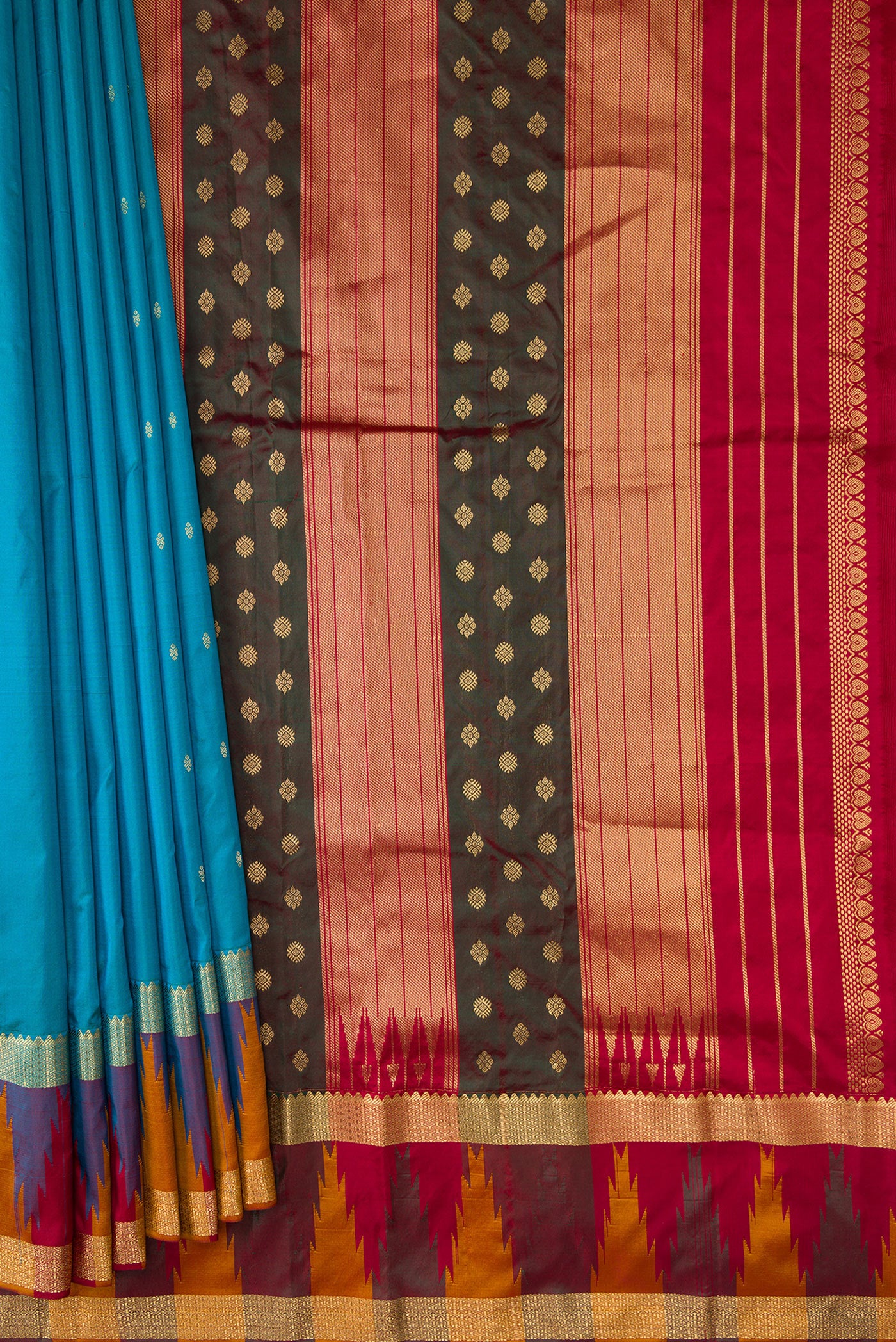 Pleats and pallu of Sky Blue Dual Tone Kanchipuram Silk Saree with Zari Butta on the body and Temple Border. 