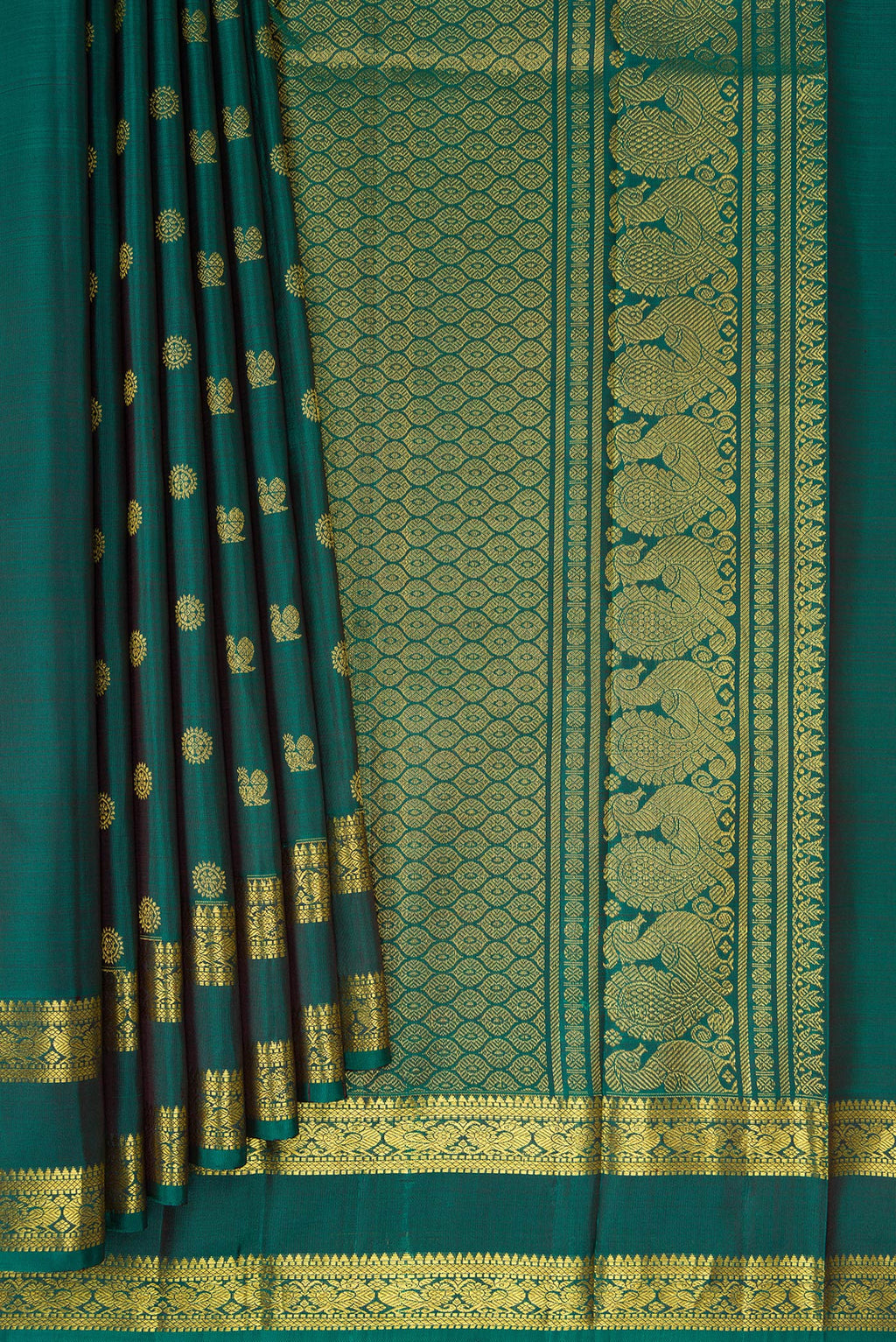 Pleats and pallu of Green Kanjivaram Silk Saree with Zari Butta on the body and Zari Border. 