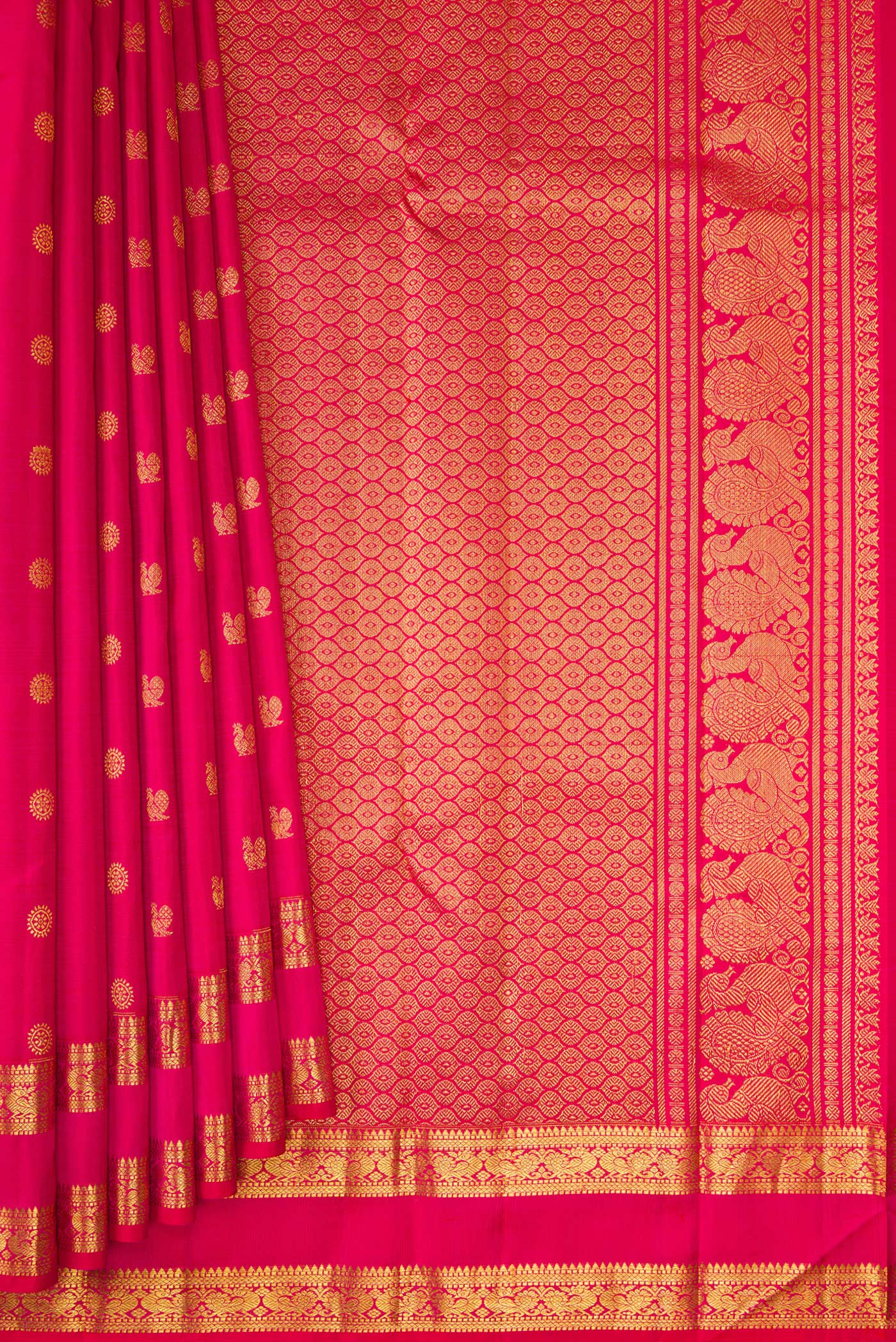 Pleats and pallu of Dark Pink Kanjivaram Silk Saree with Zari Butta on the body and Zari Border. 