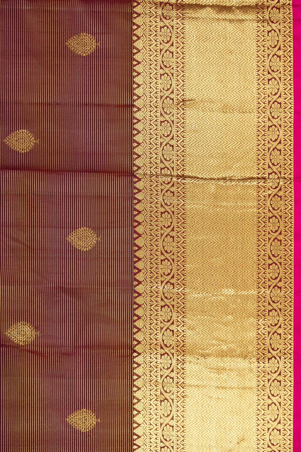 Border image of Brown Dual Tone Kanchipuram Silk Saree with Stripes on the body and Zari Border. 