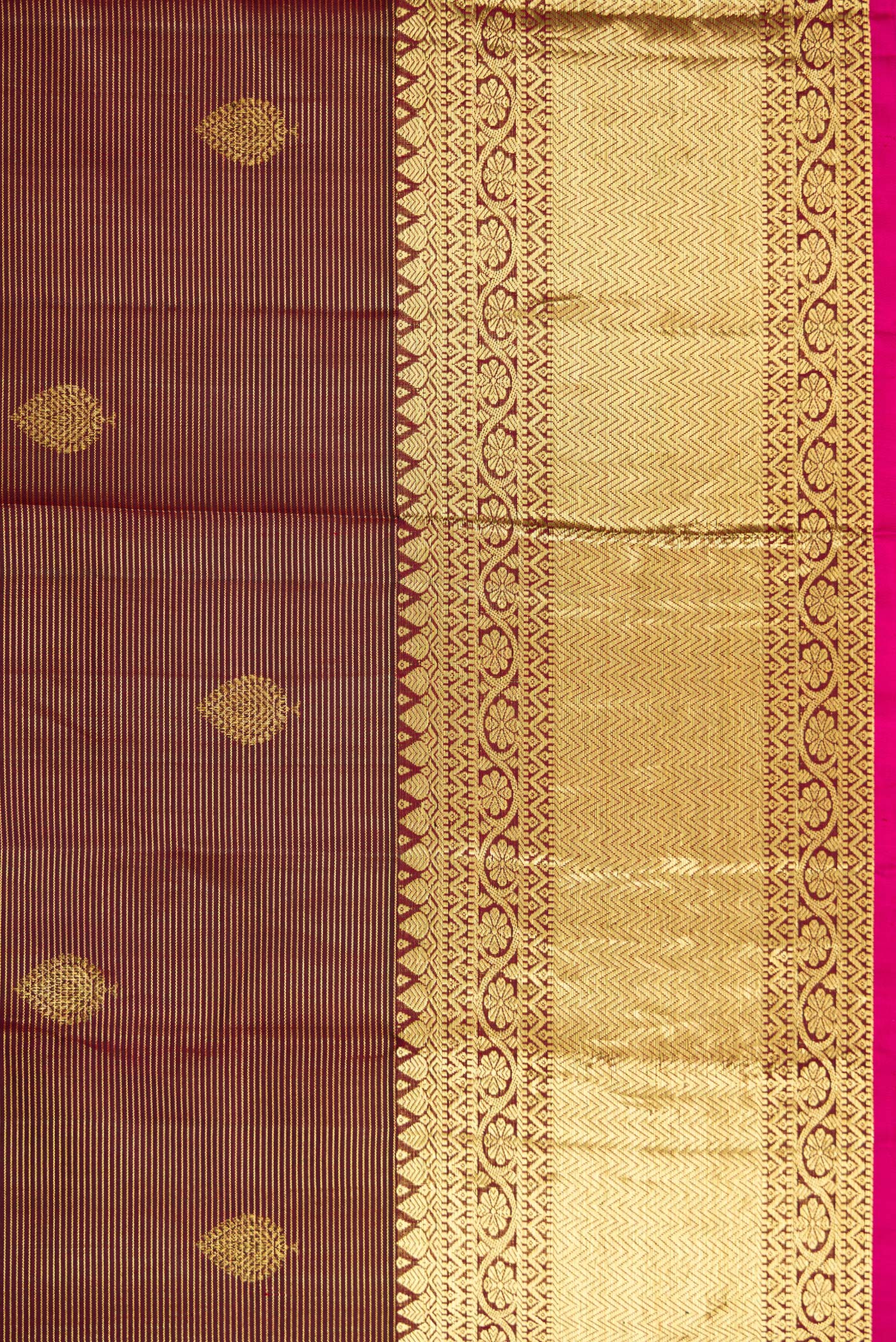 Border image of Brown Dual Tone Kanchipuram Silk Saree with Stripes on the body and Zari Border. 
