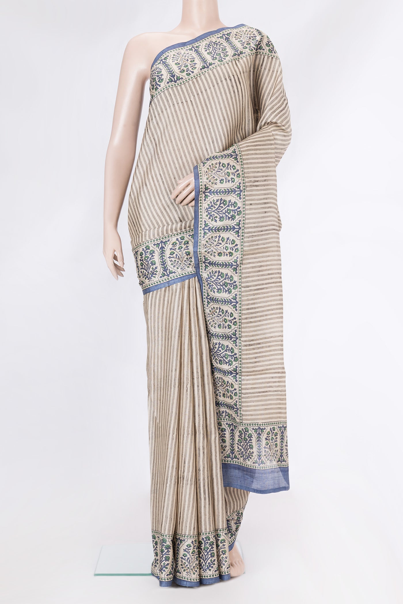 Beige Dual Tone Tussar Silk Saree with Stripes on the body and Embroidery Border.  displayed on a mannequin