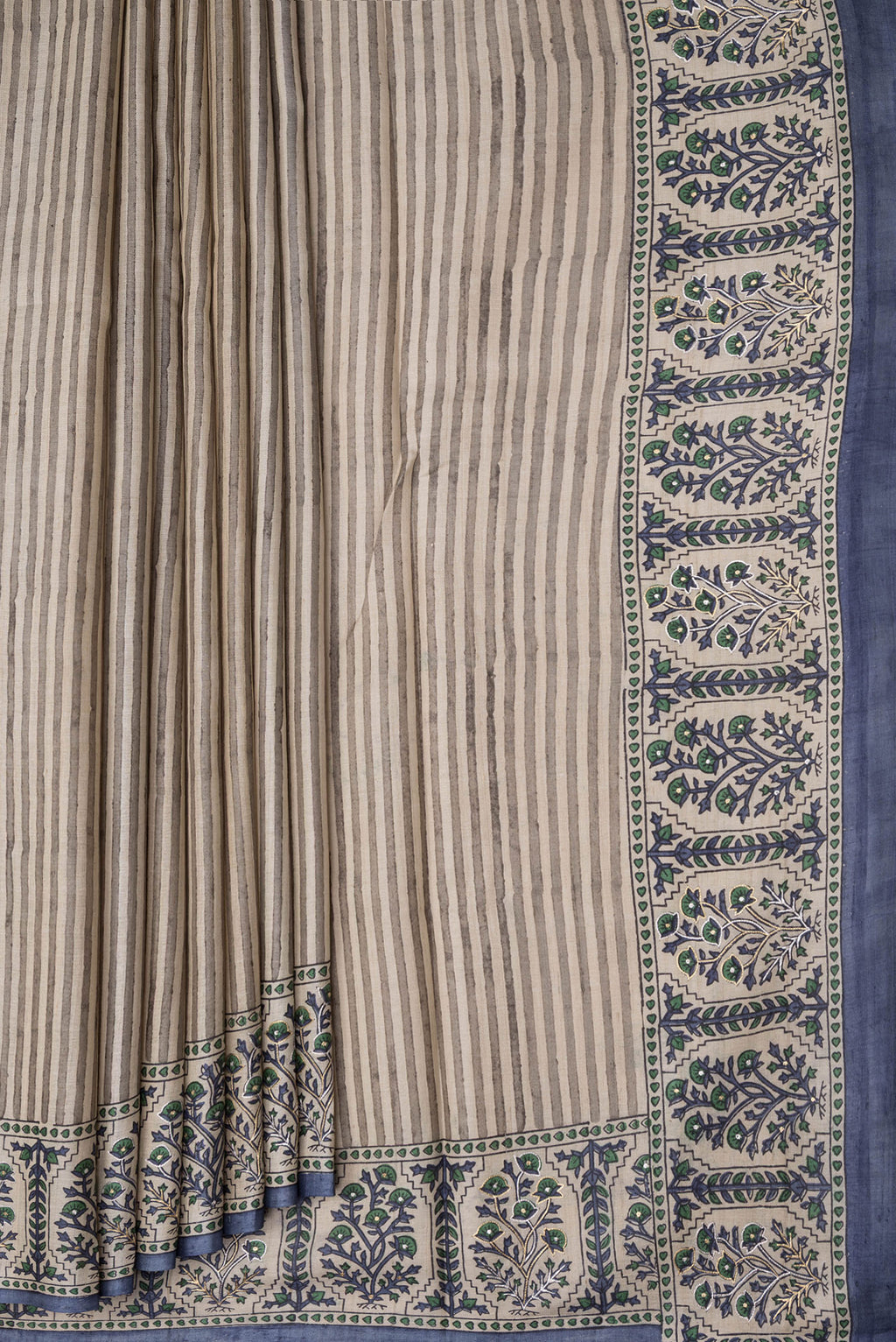 Pleats and pallu of Beige Dual Tone Tussar Silk Saree with Stripes on the body and Embroidery Border. 